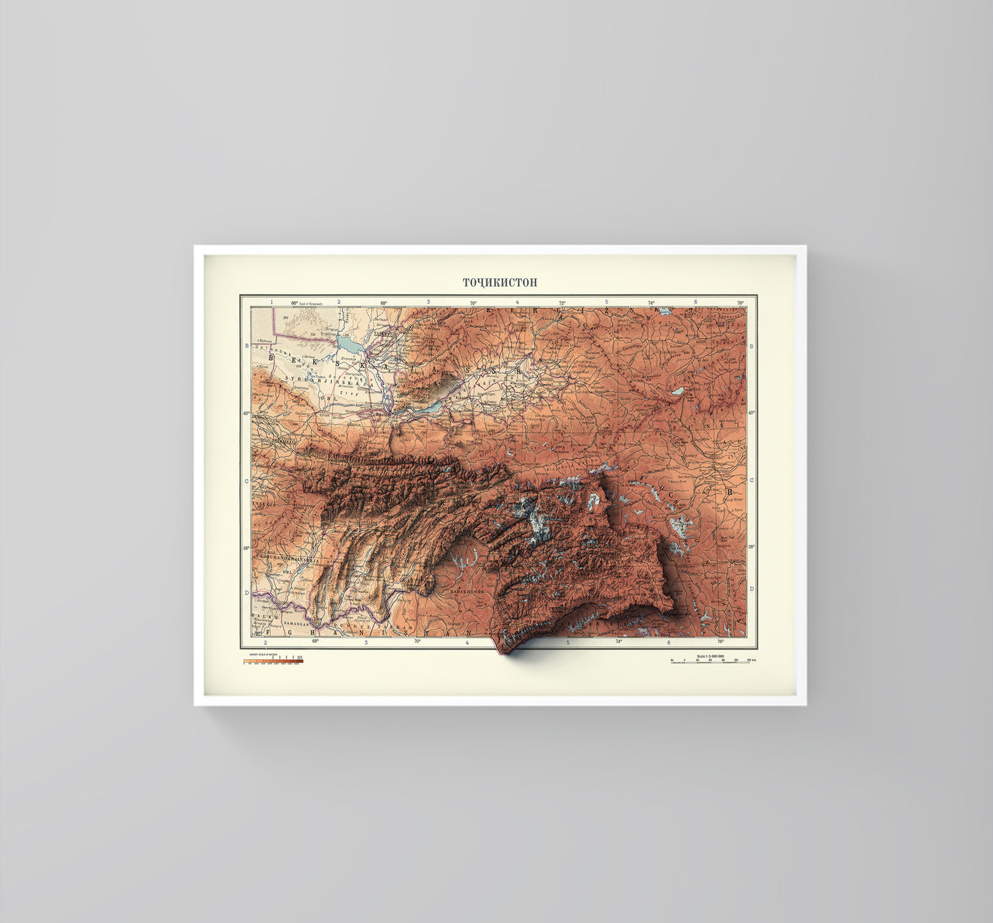 Tajikistan vintage framed shaded relief map in white frame. Artistic print highlighting mountains with a realistic 3d effect