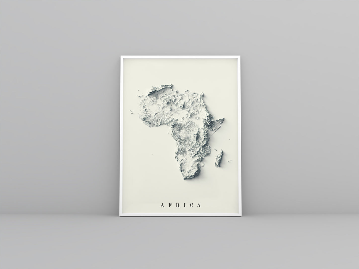 Africa framed shaded relief map in white frame. Artistic print highlighting mountains with a realistic 3d effect