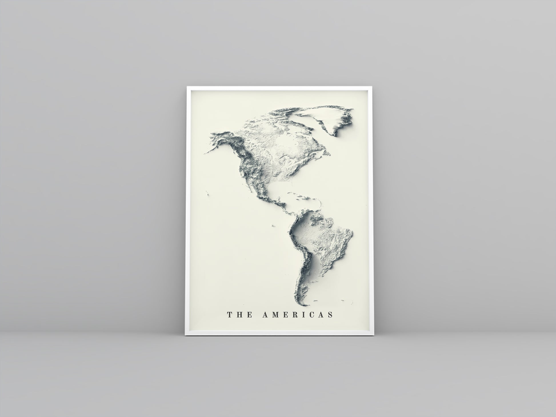 American Continent framed shaded relief map in white frame. Artistic print highlighting mountains with a realistic 3d effect
