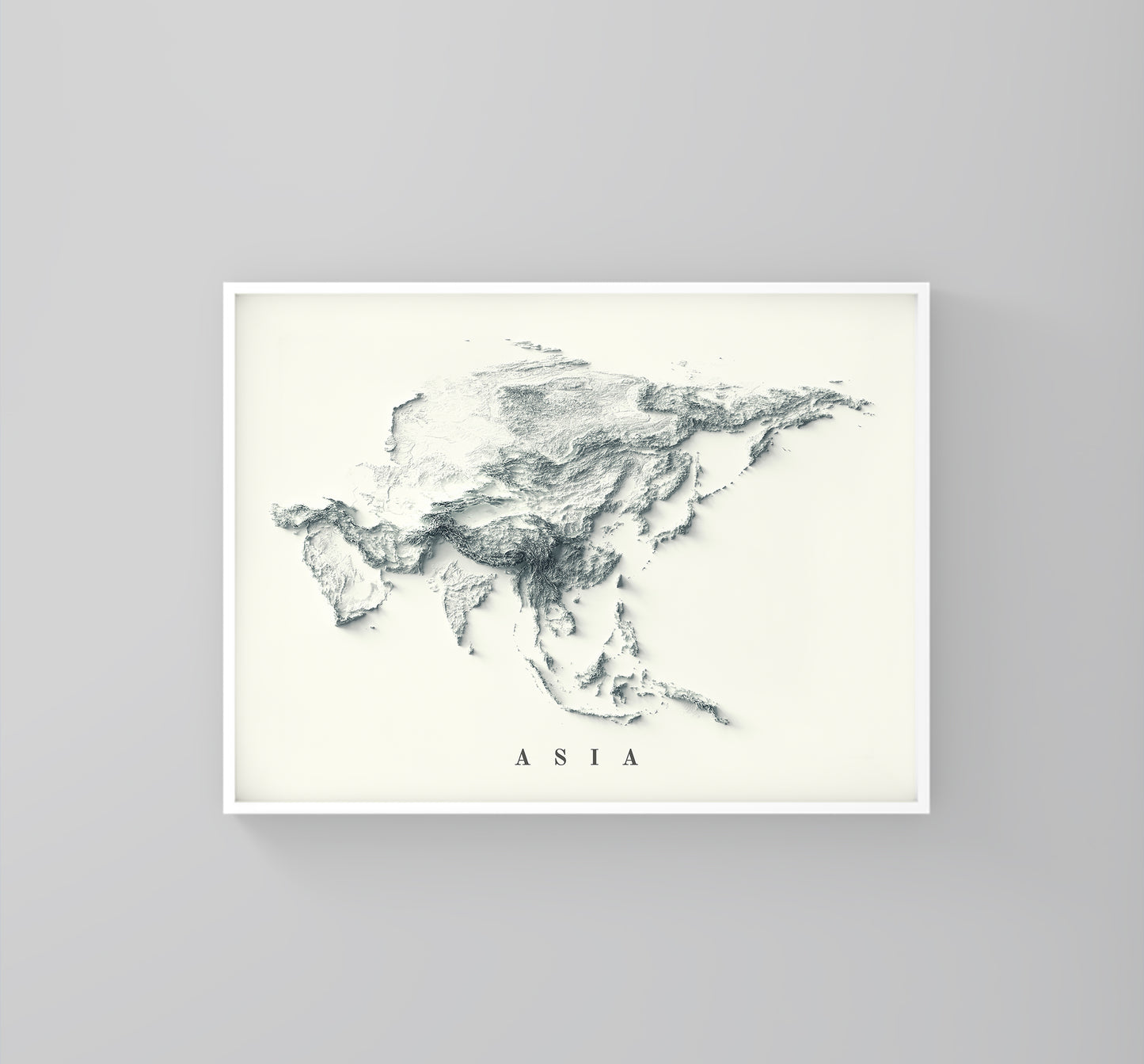 Asia framed shaded relief map in white frame. Artistic print highlighting mountains with a realistic 3d effect