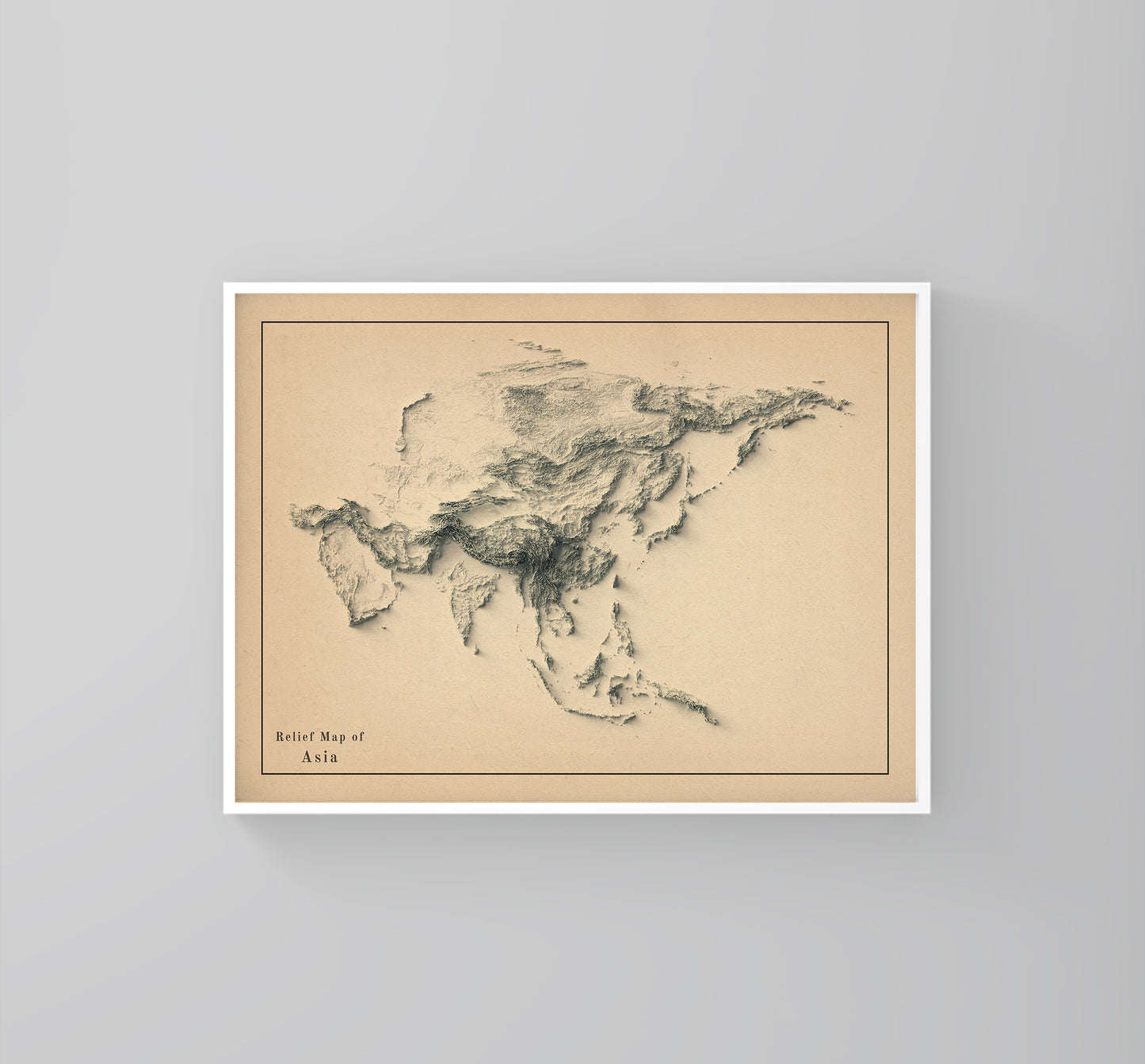 Asia antique framed shaded relief map in white frame. Artistic print highlighting mountains with a realistic 3d effect