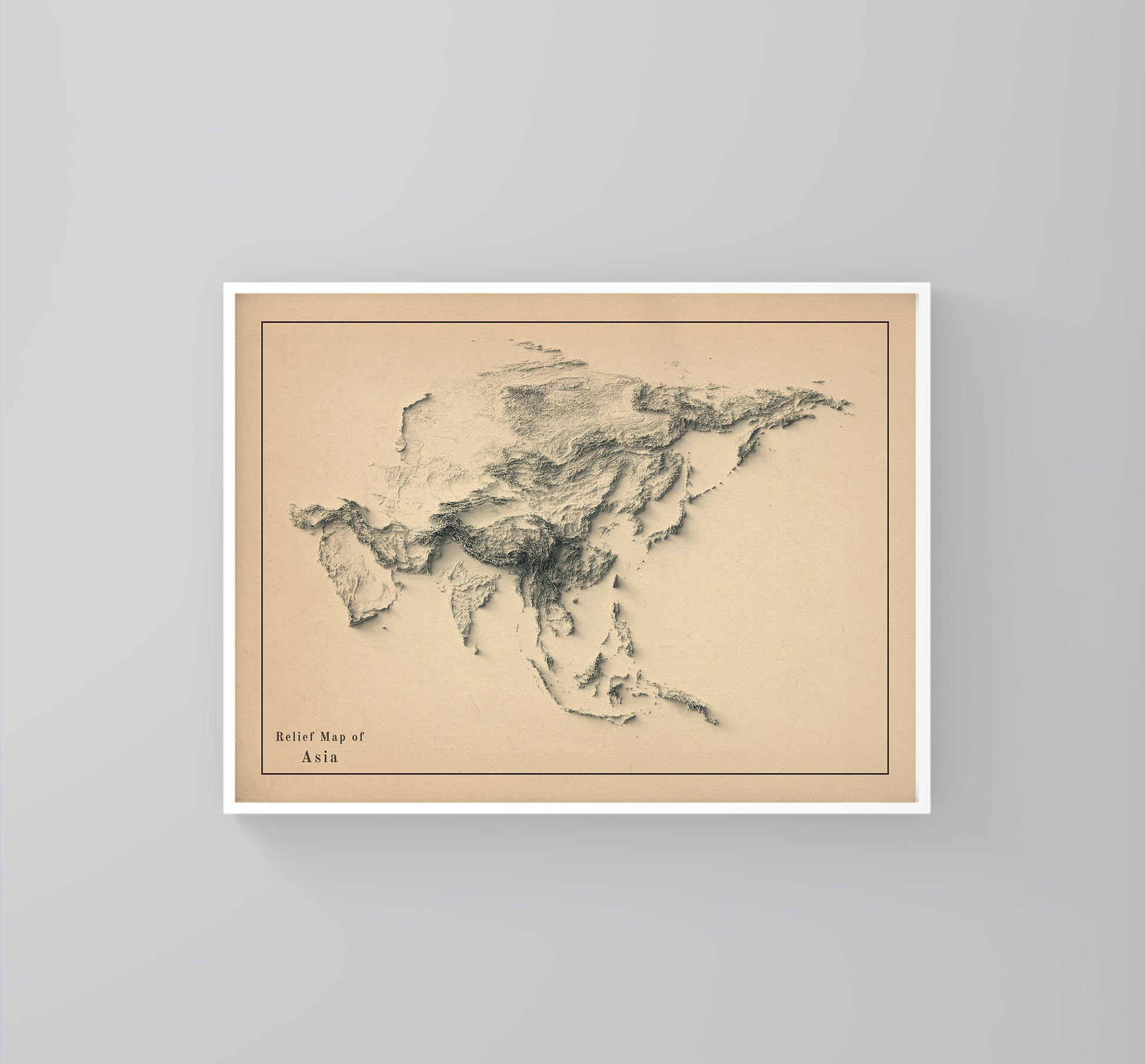 Asia antique framed shaded relief map in white frame. Artistic print highlighting mountains with a realistic 3d effect