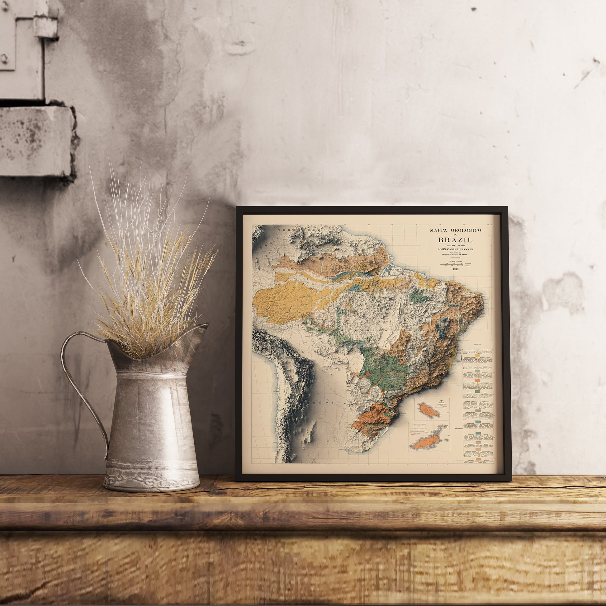 Vintage Brazil shaded relief map in black frame. Realistic terrain art print for home decor, displayed on rustic wooden table
