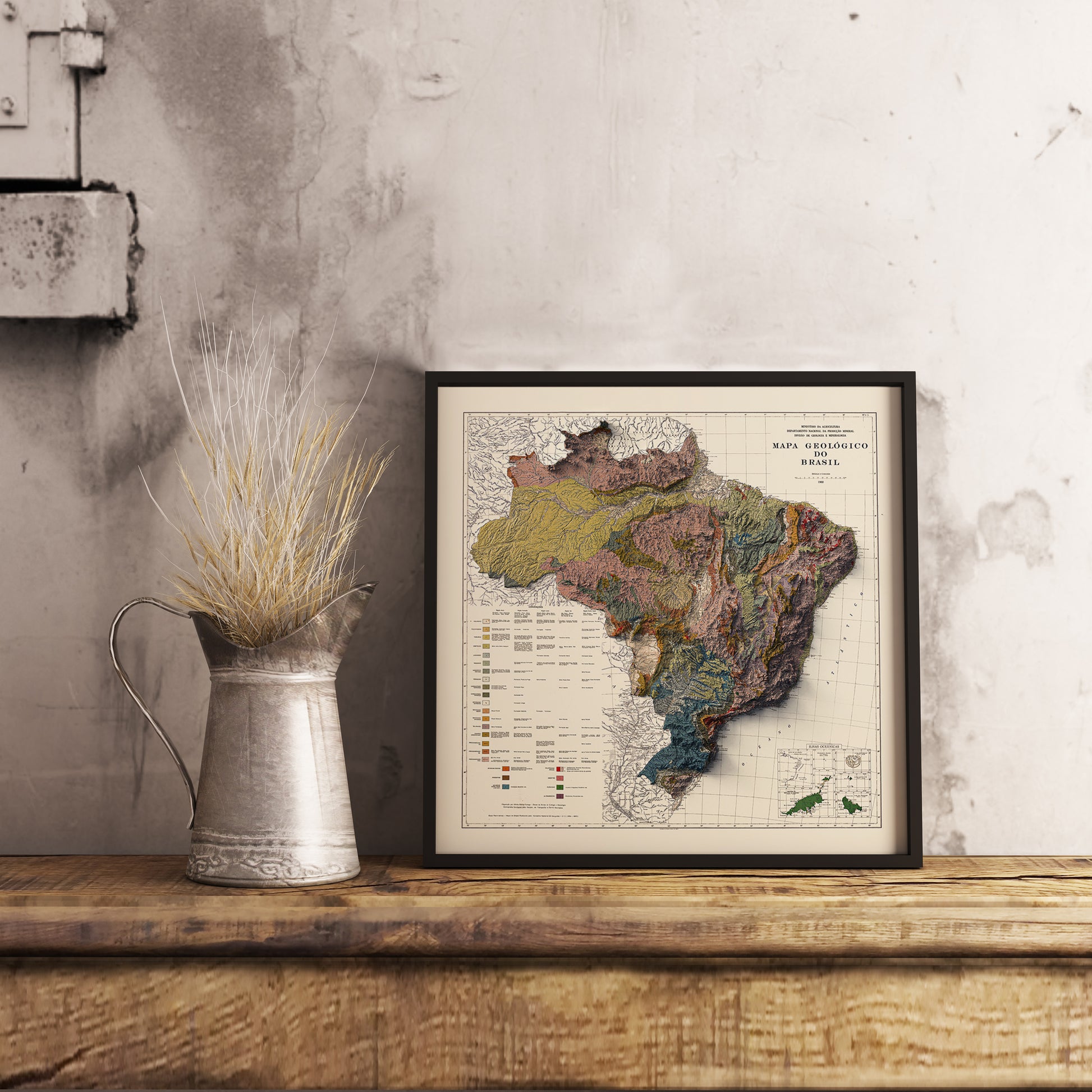 Vintage Brazil shaded relief map in black frame. Realistic terrain art print for home decor, displayed on rustic wooden table