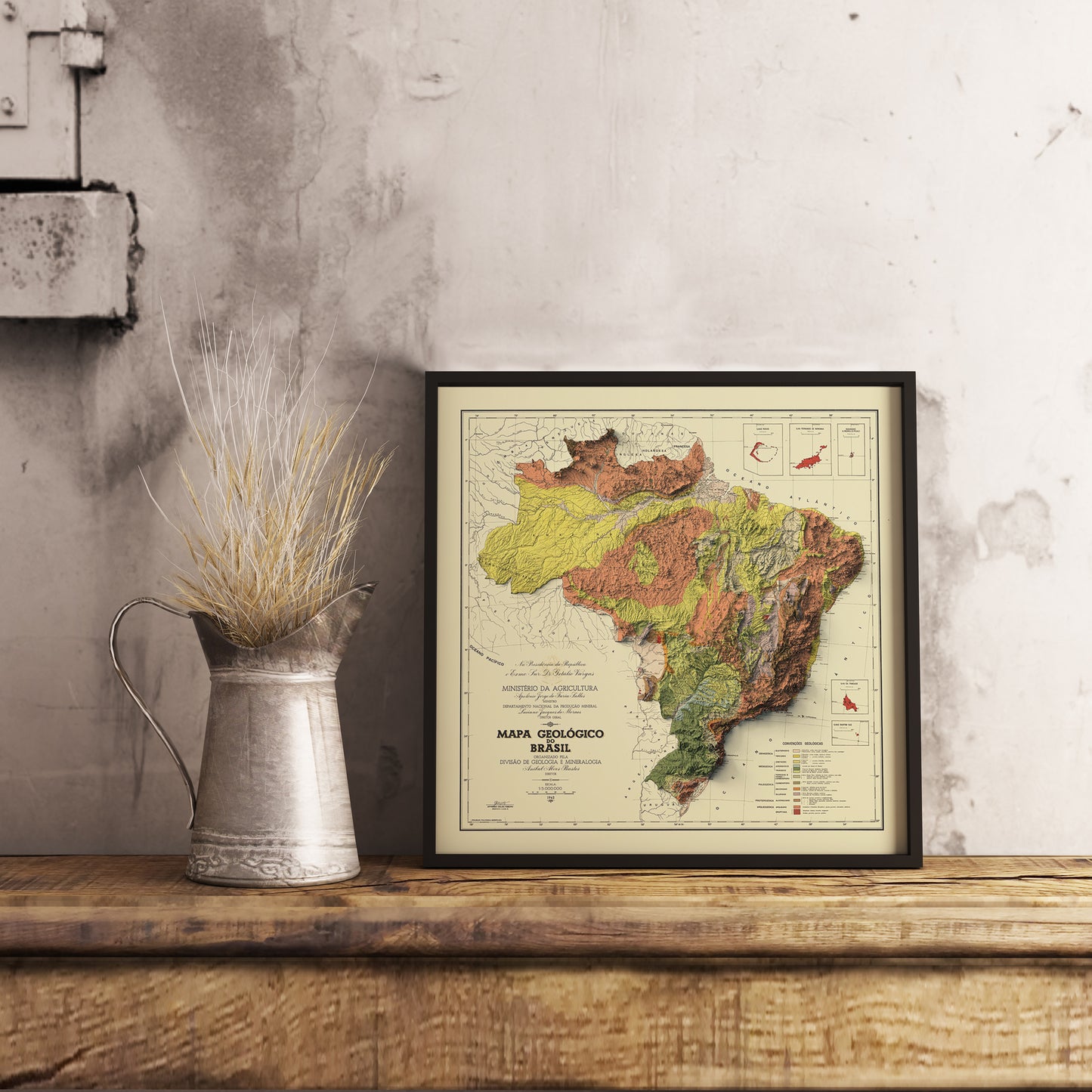 Vintage Brazil shaded relief map in black frame. Realistic terrain art print for home decor, displayed on rustic wooden table