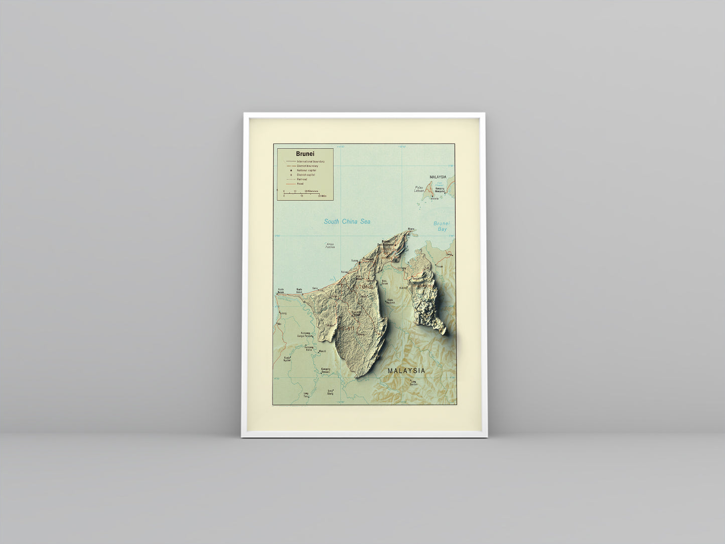 Brunei vintage framed shaded relief map in white frame. Artistic print highlighting mountains with a realistic 3d effect