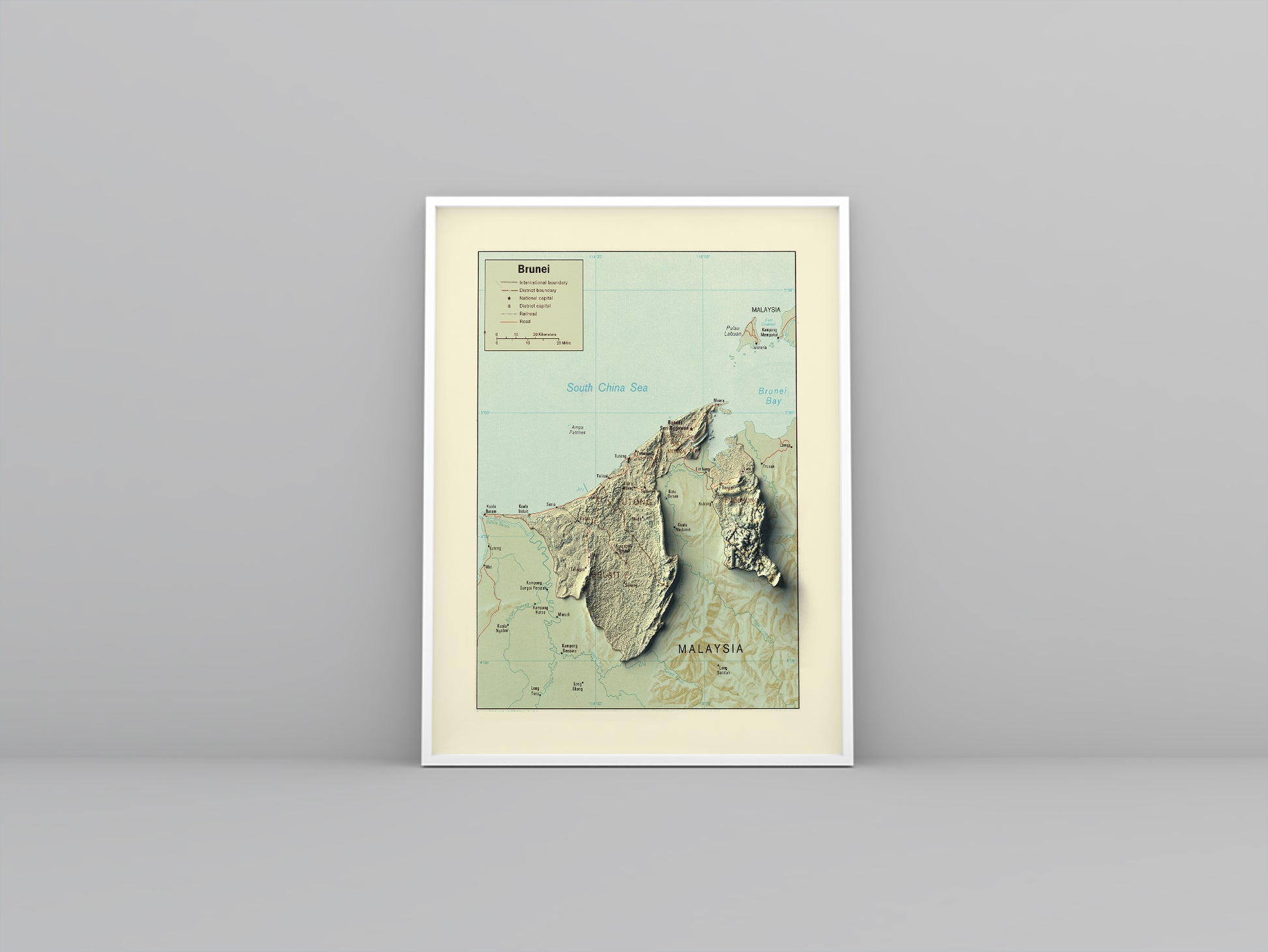 Brunei vintage framed shaded relief map in white frame. Artistic print highlighting mountains with a realistic 3d effect