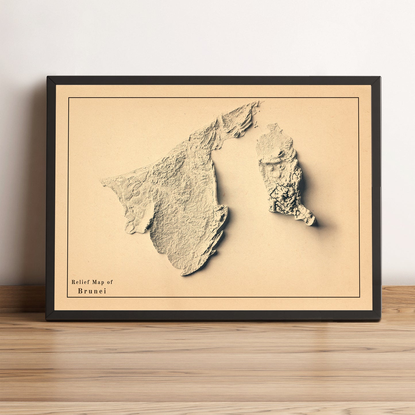 Brunei vintage framed shaded relief map in black frame. Artistic print highlighting mountains with a realistic terrain effect