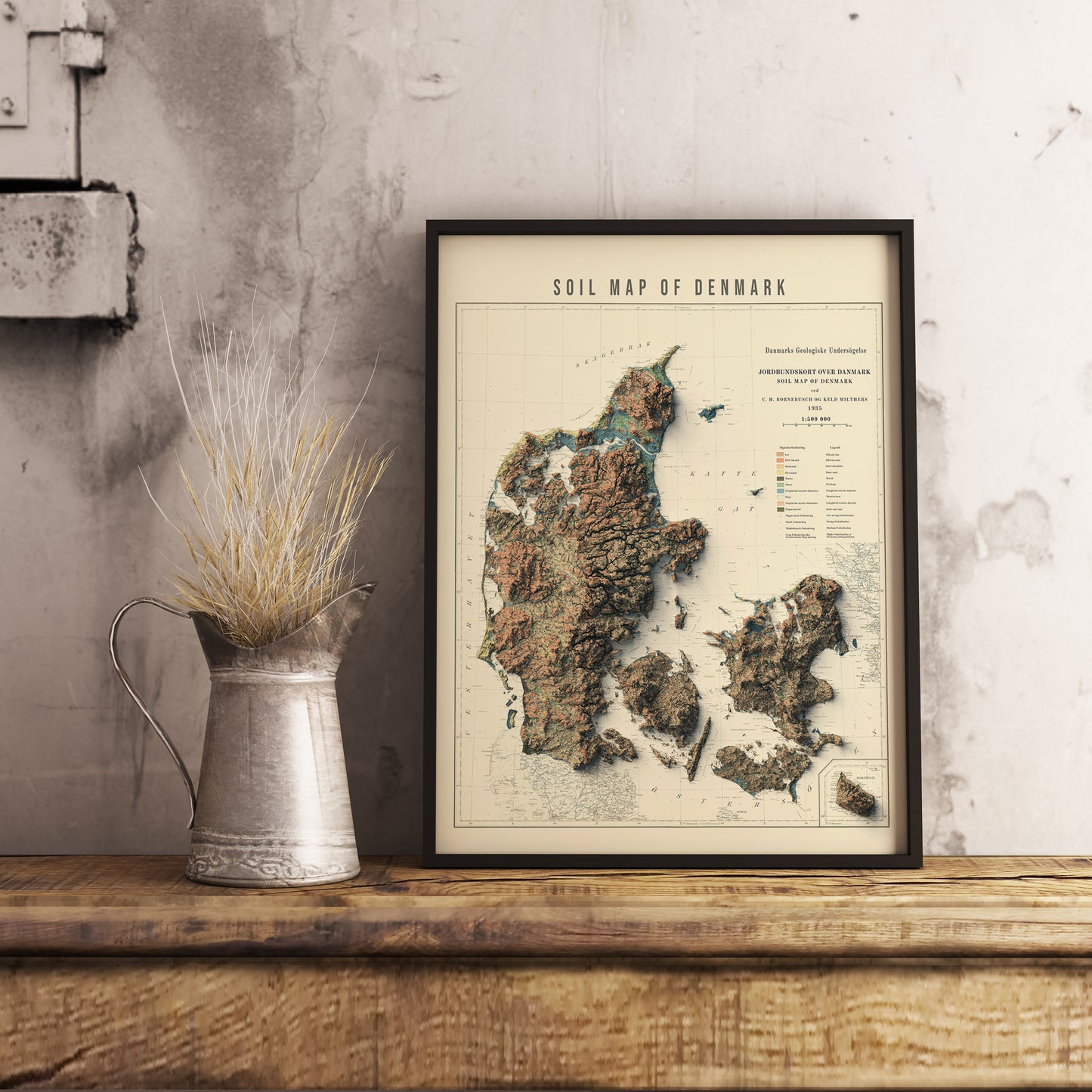 Vintage Denmark shaded relief map in black frame. Realistic terrain art print for home decor, displayed on rustic wooden table