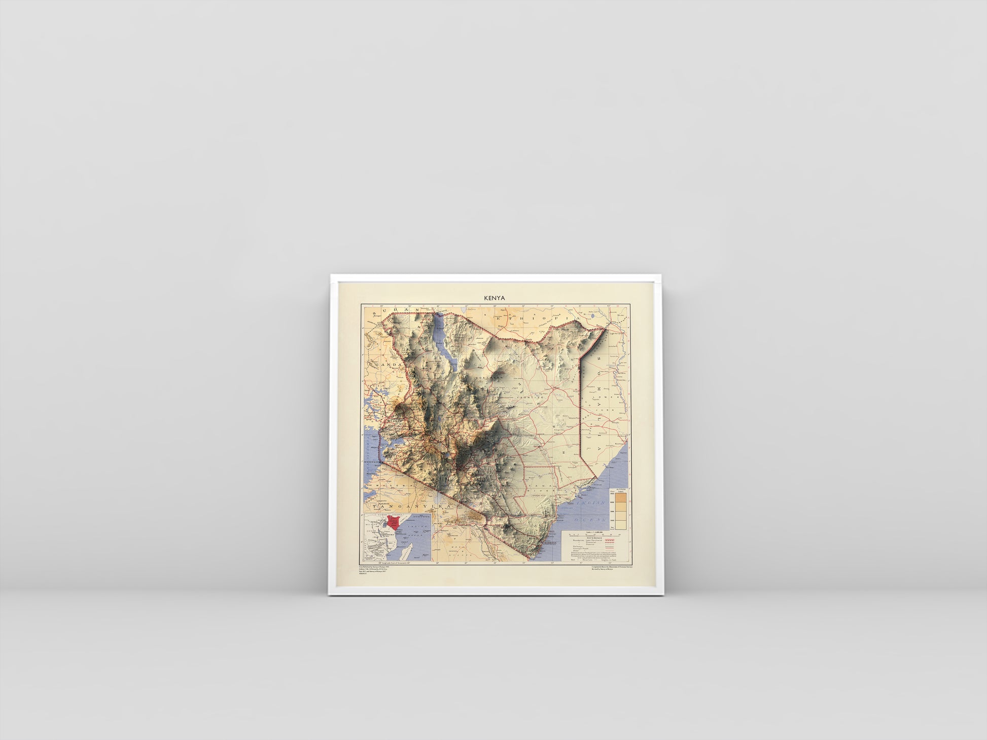 Kenya vintage framed shaded relief map in white frame. Artistic print highlighting mountains with a realistic 3d effect