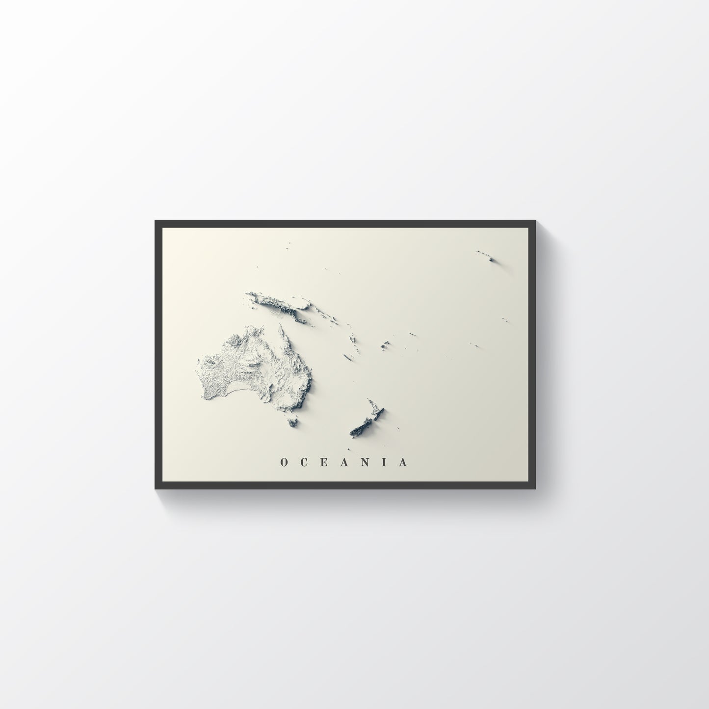 Oceania vintage framed shaded relief map in black frame. Artistic print highlighting mountains with a realistic terrain effect