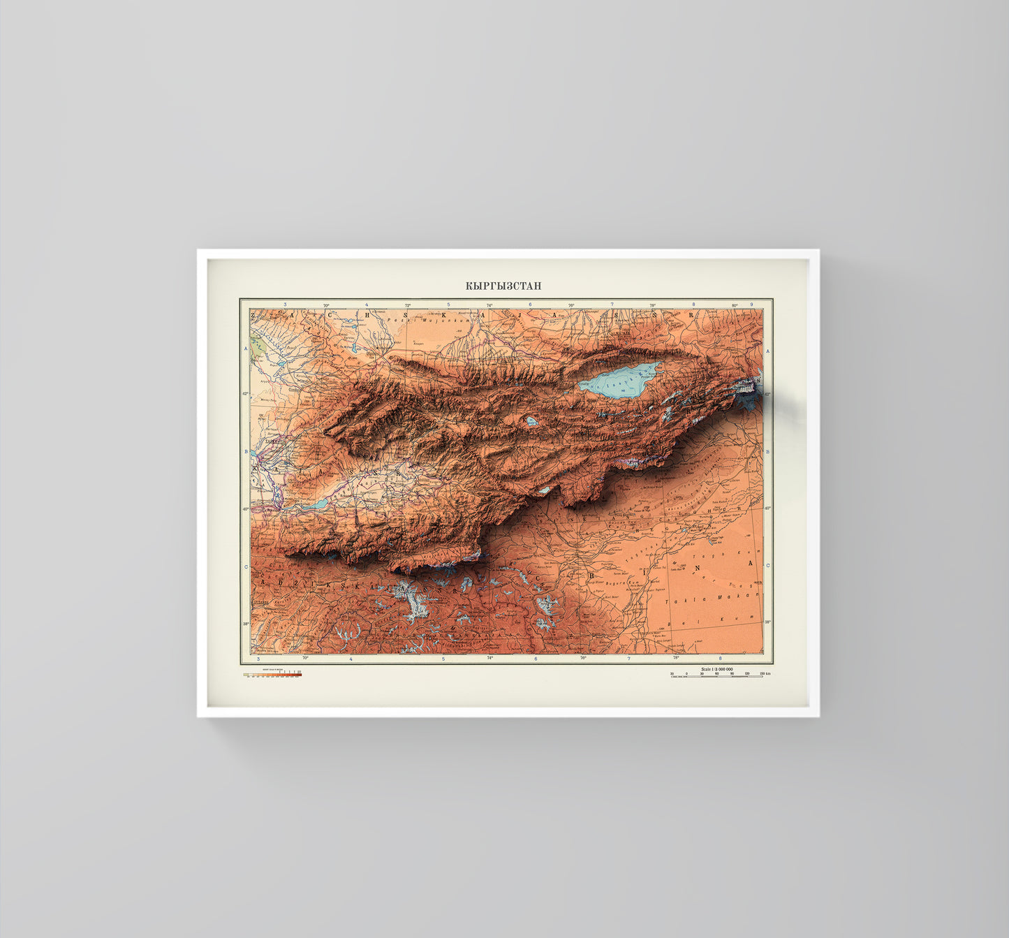 Kyrgyzstan vintage framed shaded relief map in white frame. Artistic print highlighting mountains with a realistic 3d effect