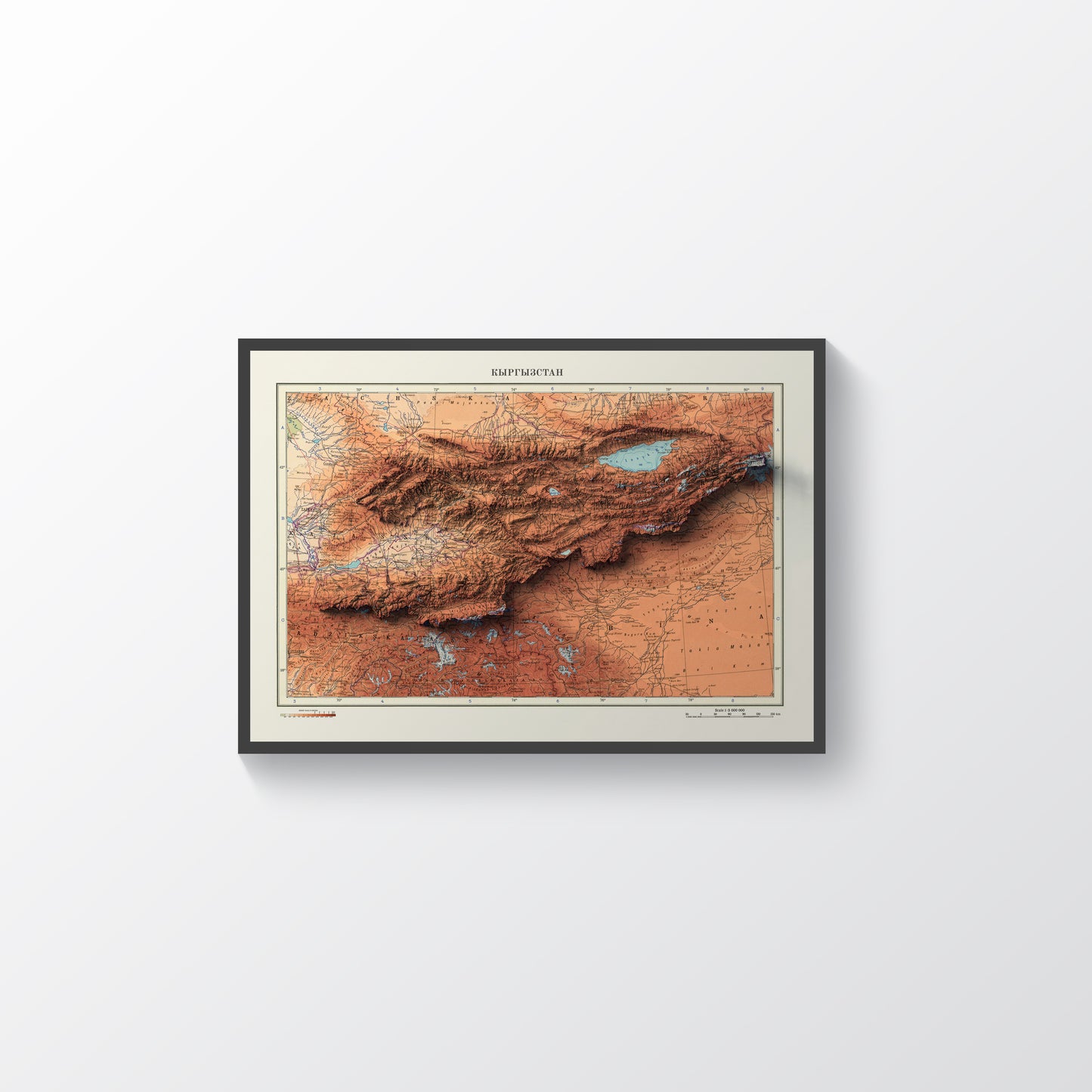 Kyrgyzstan vintage framed shaded relief map in black frame. Artistic print highlighting mountains with a realistic terrain effect