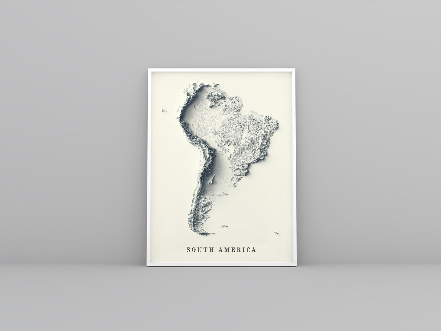 South America vintage framed shaded relief map in white frame. Artistic print highlighting mountains with a realistic 3d effect
