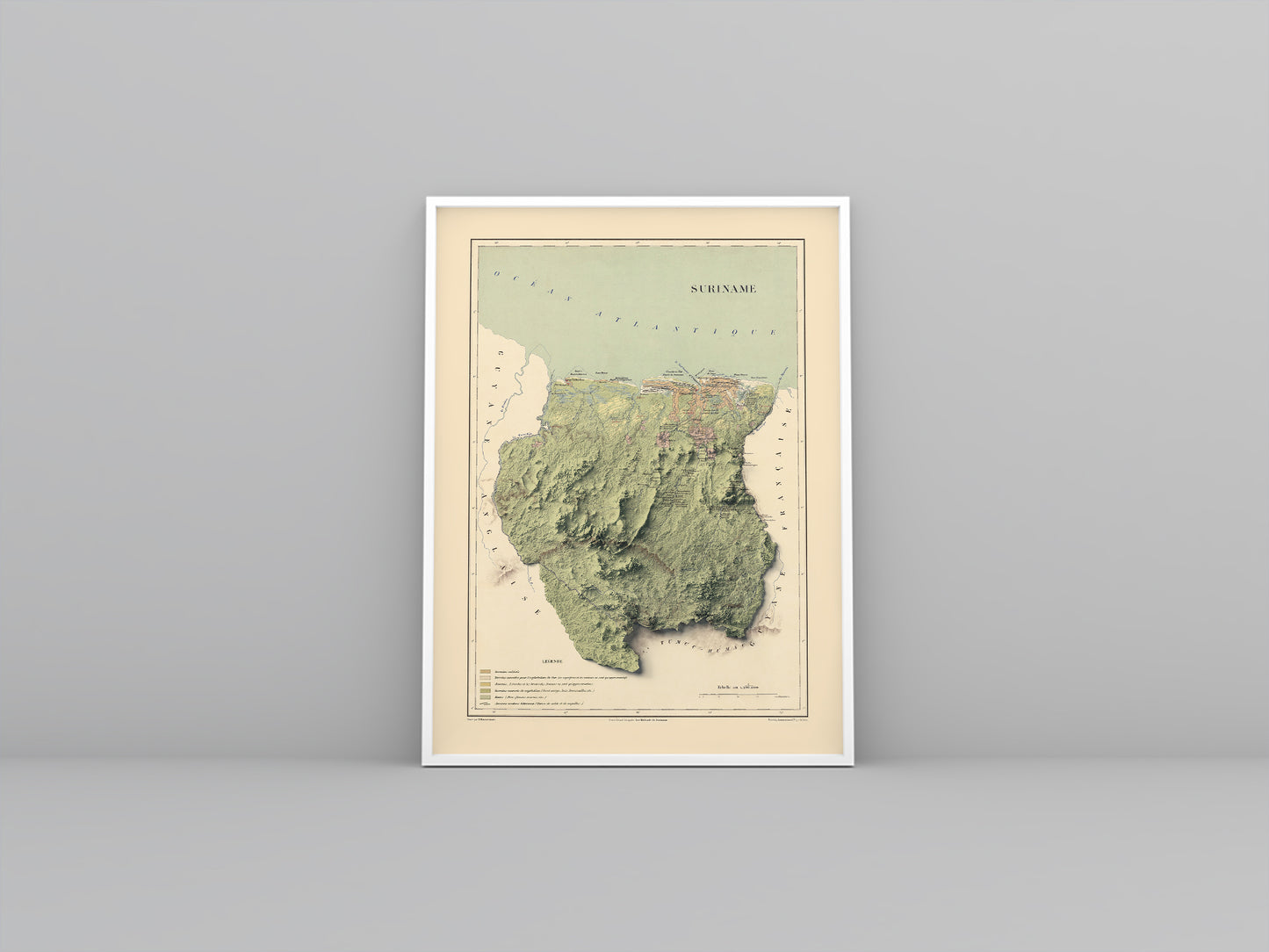 Suriname vintage framed shaded relief map in white frame. Artistic print highlighting mountains with a realistic 3d effect