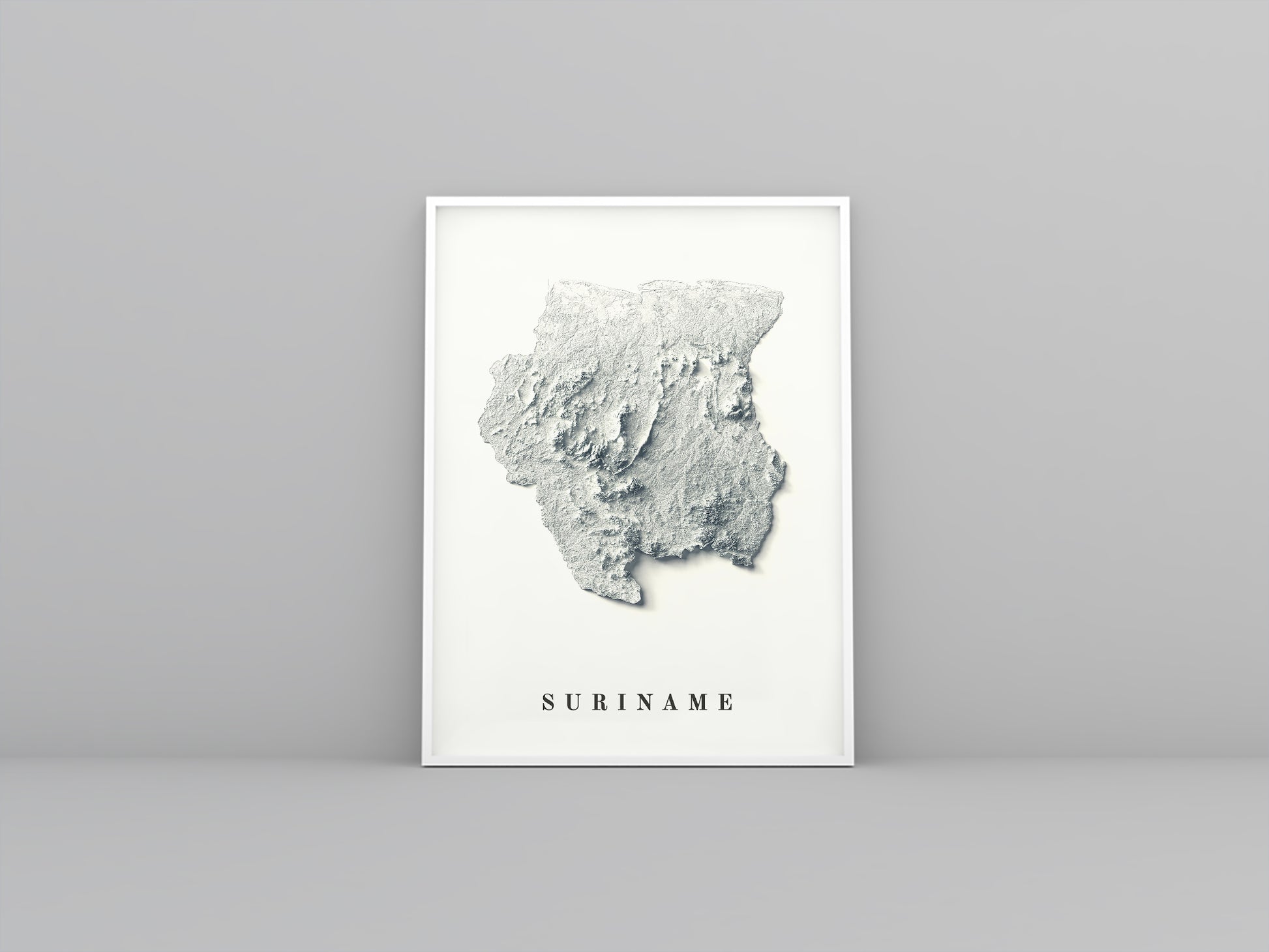 Suriname framed shaded relief map in white frame. Artistic print highlighting mountains with a realistic 3d effect