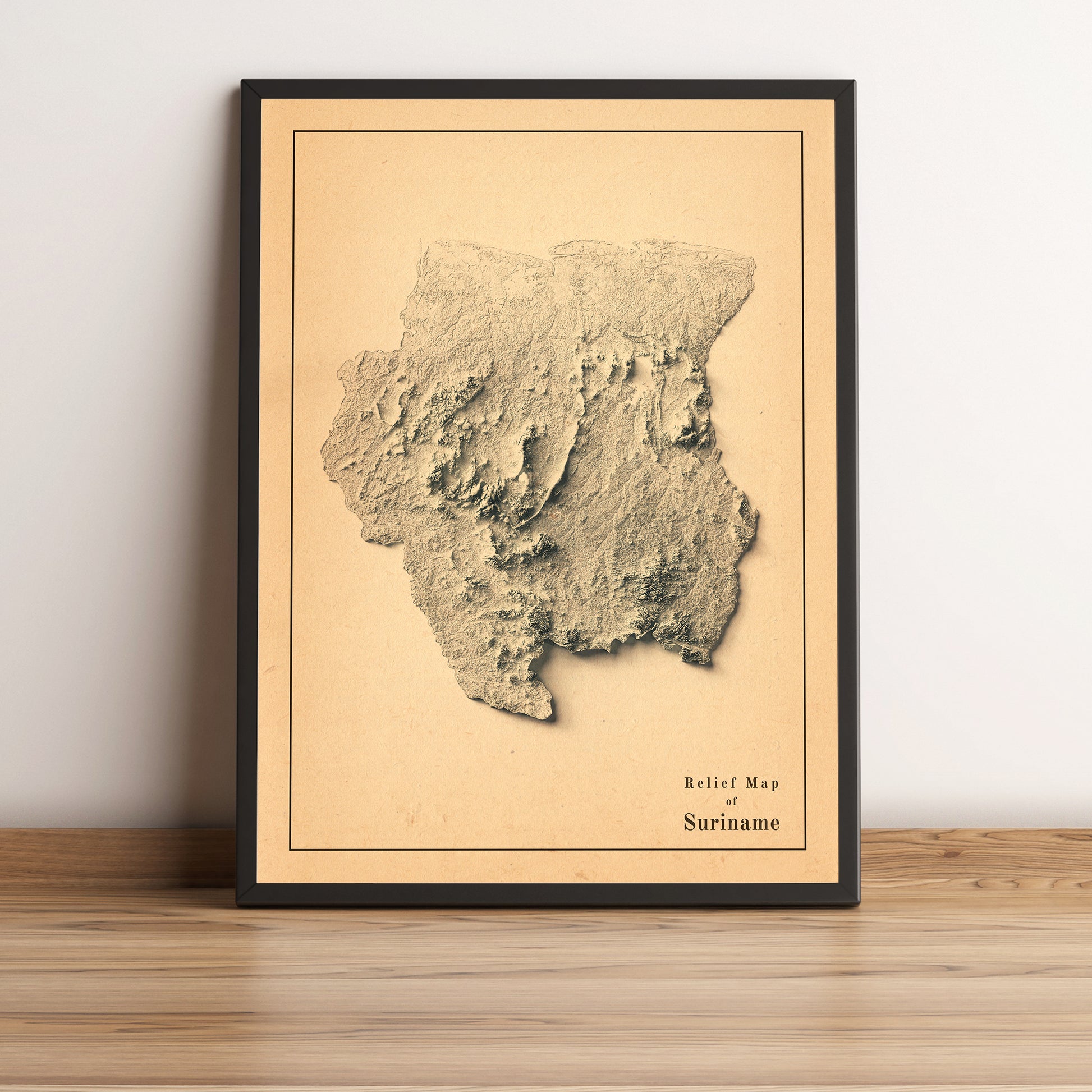 Suriname vintage framed shaded relief map in black frame. Artistic print highlighting mountains with a realistic terrain effect