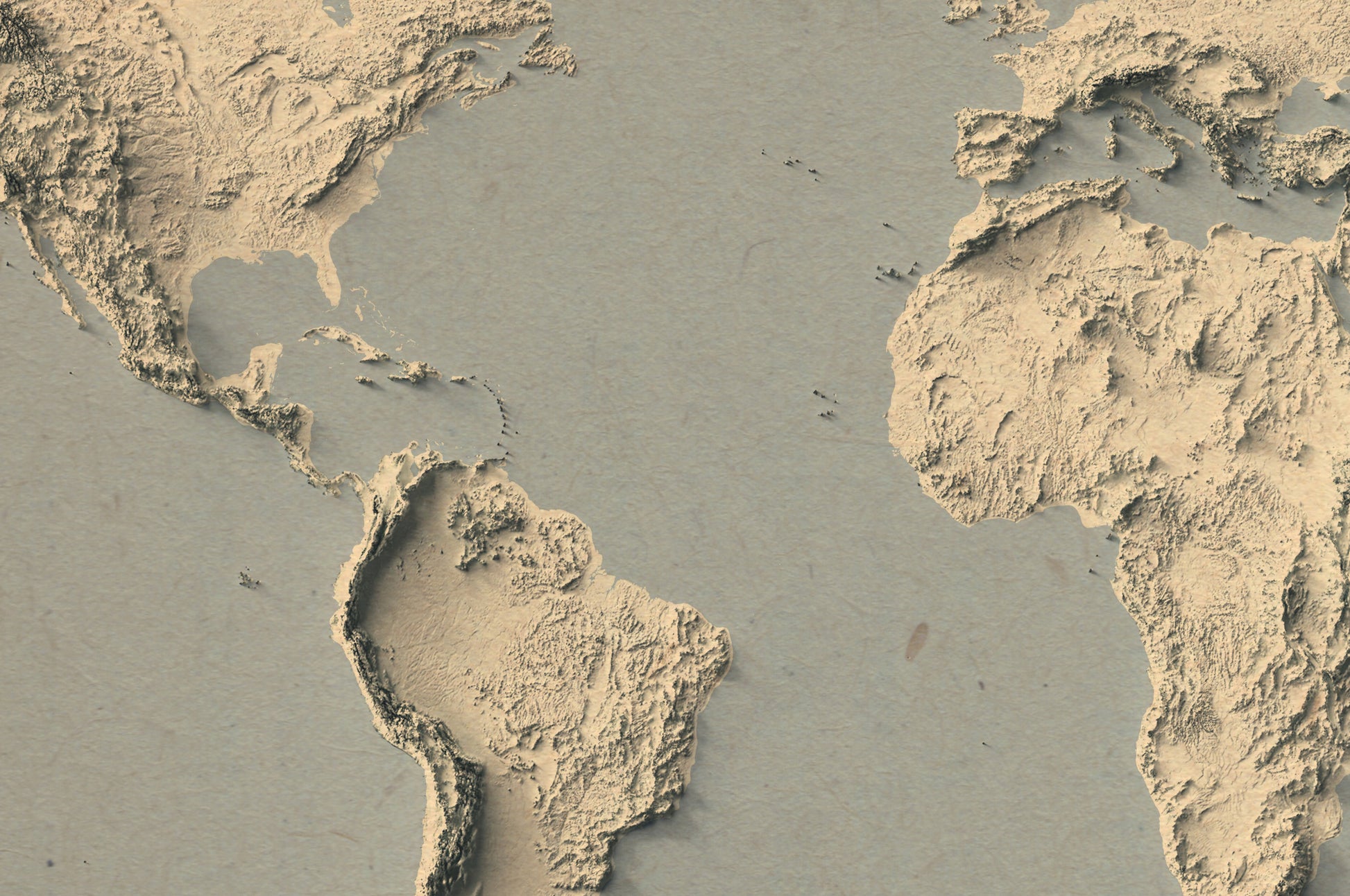 Detailed close-up of a vintage World relief map and blue ocean, showcasing textured topography and geographic contours