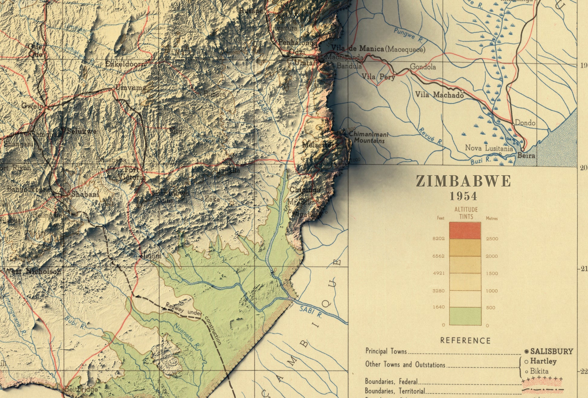 Detailed close-up of a vintage Zimbabwe relief map, showcasing textured topography and geographic contours