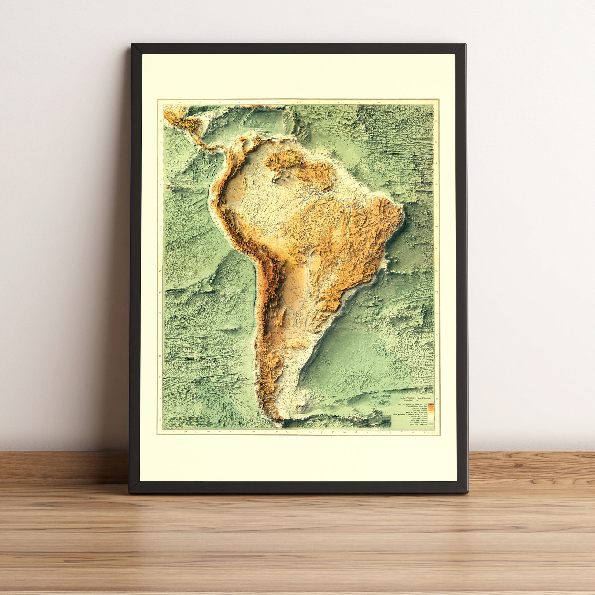 South America Bathymetrical vintage framed shaded relief map in black frame. Artistic print highlighting mountains with a realistic terrain effect