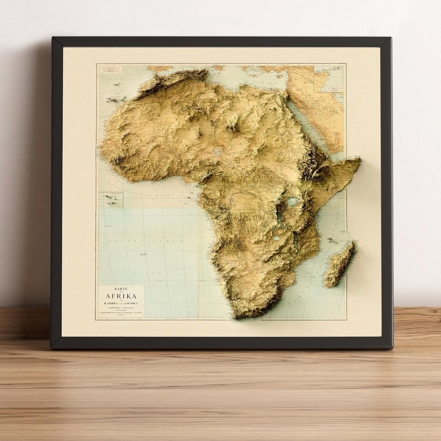 africa vintage framed shaded relief map in black frame. Artistic print highlighting mountains with a realistic terrain effect