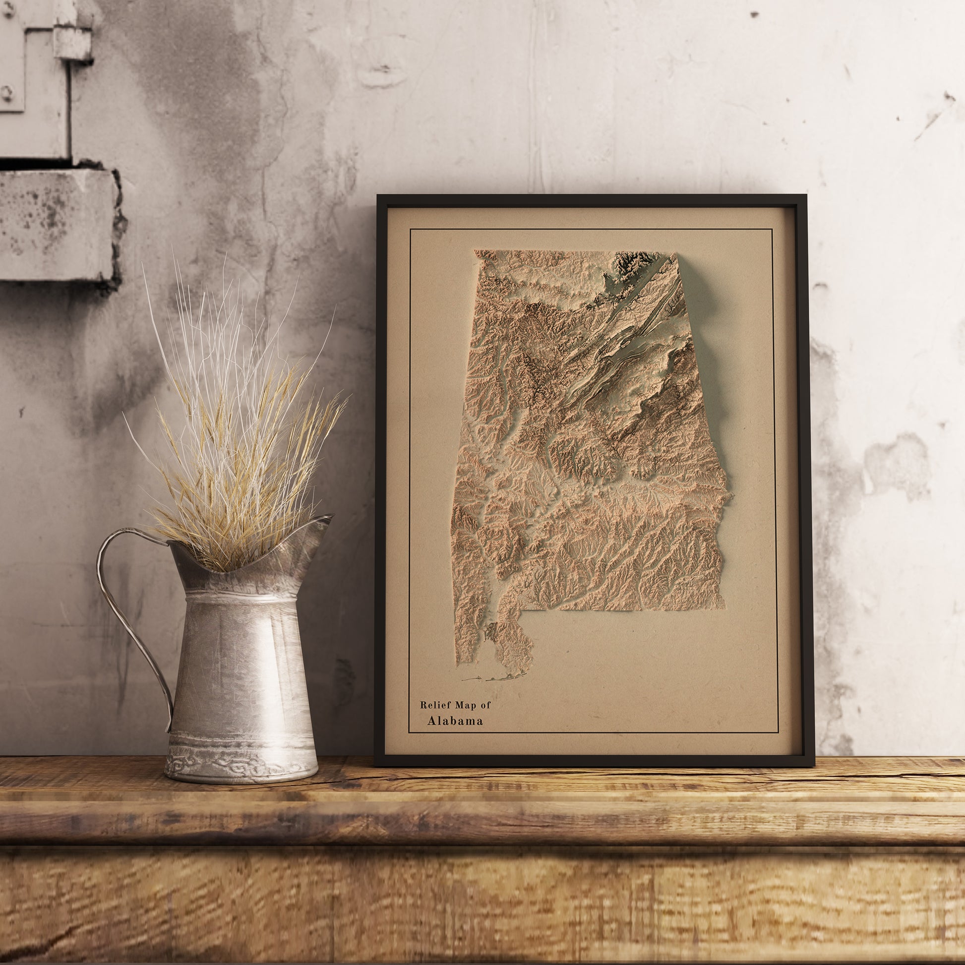 Vintage Alabama (USA) shaded relief map in black frame. Realistic terrain art print for home decor, displayed on rustic wooden table