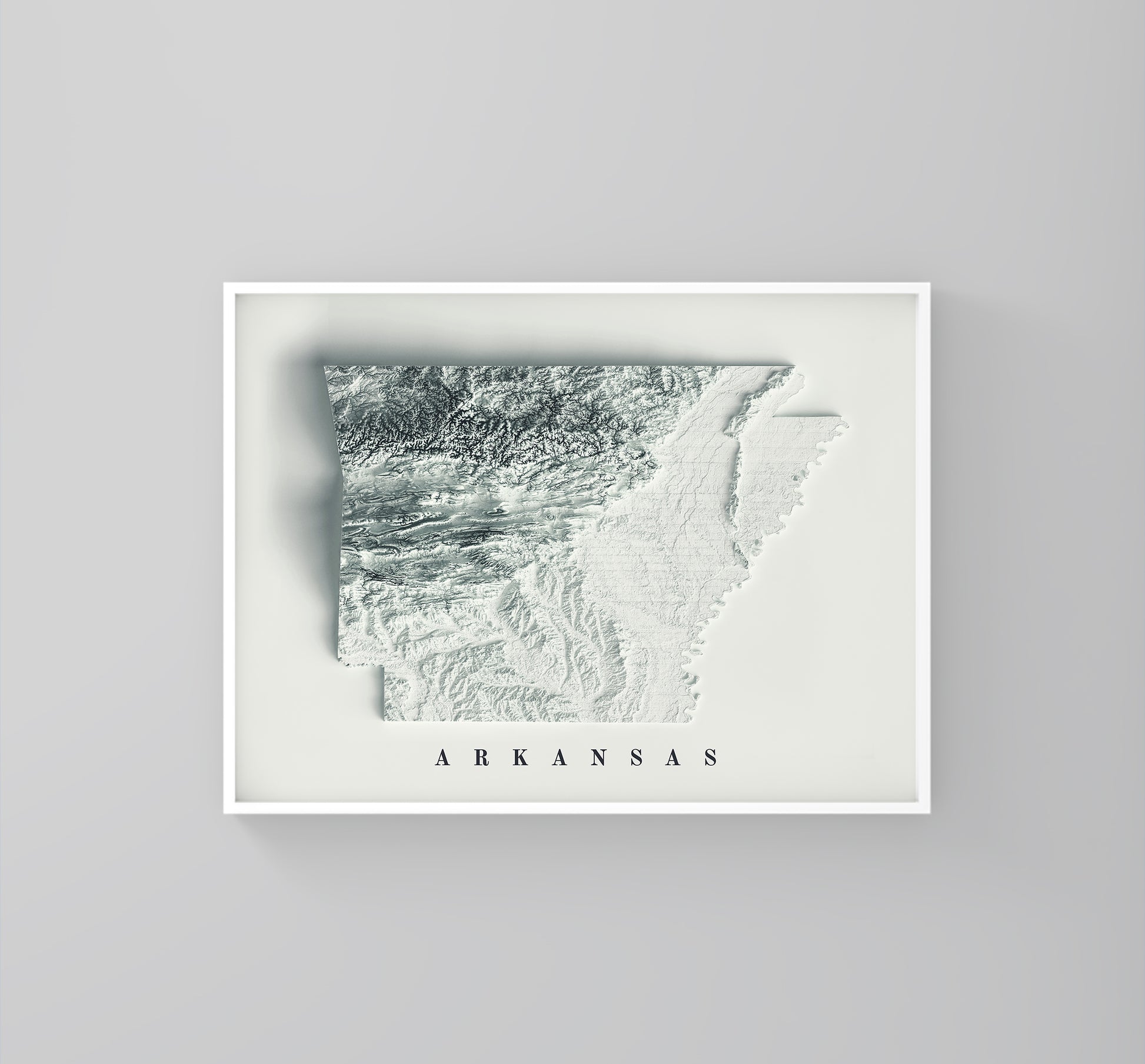 Arkansas (USA) framed shaded relief map in white frame. Artistic print highlighting mountains with a realistic 3d effect