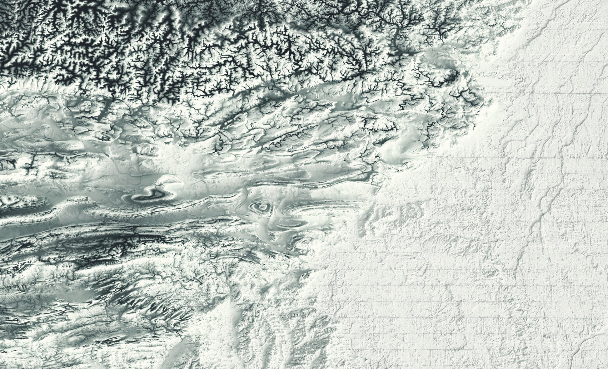 Detailed close-up of a vintage Arkansas (USA) relief map, showcasing textured topography and geographic contours