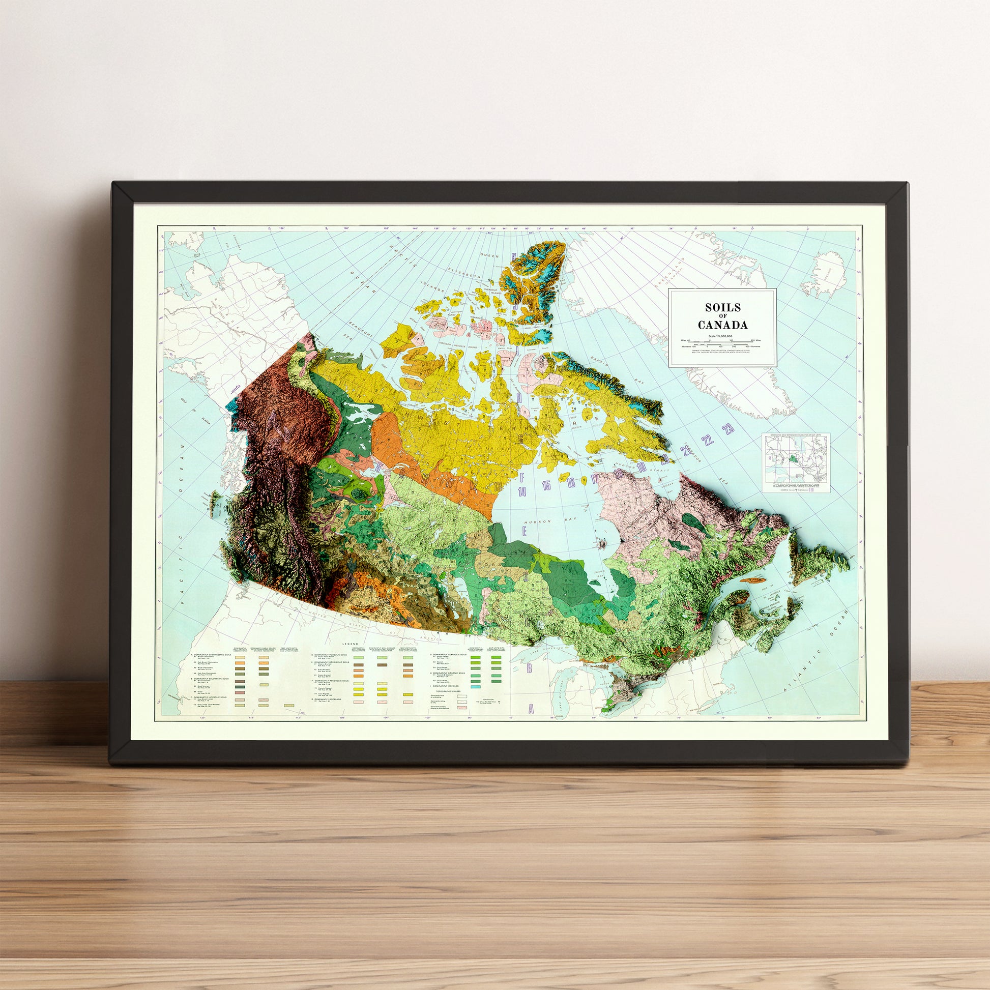Canada vintage framed shaded relief map in black frame. Artistic print highlighting mountains with a realistic terrain effect