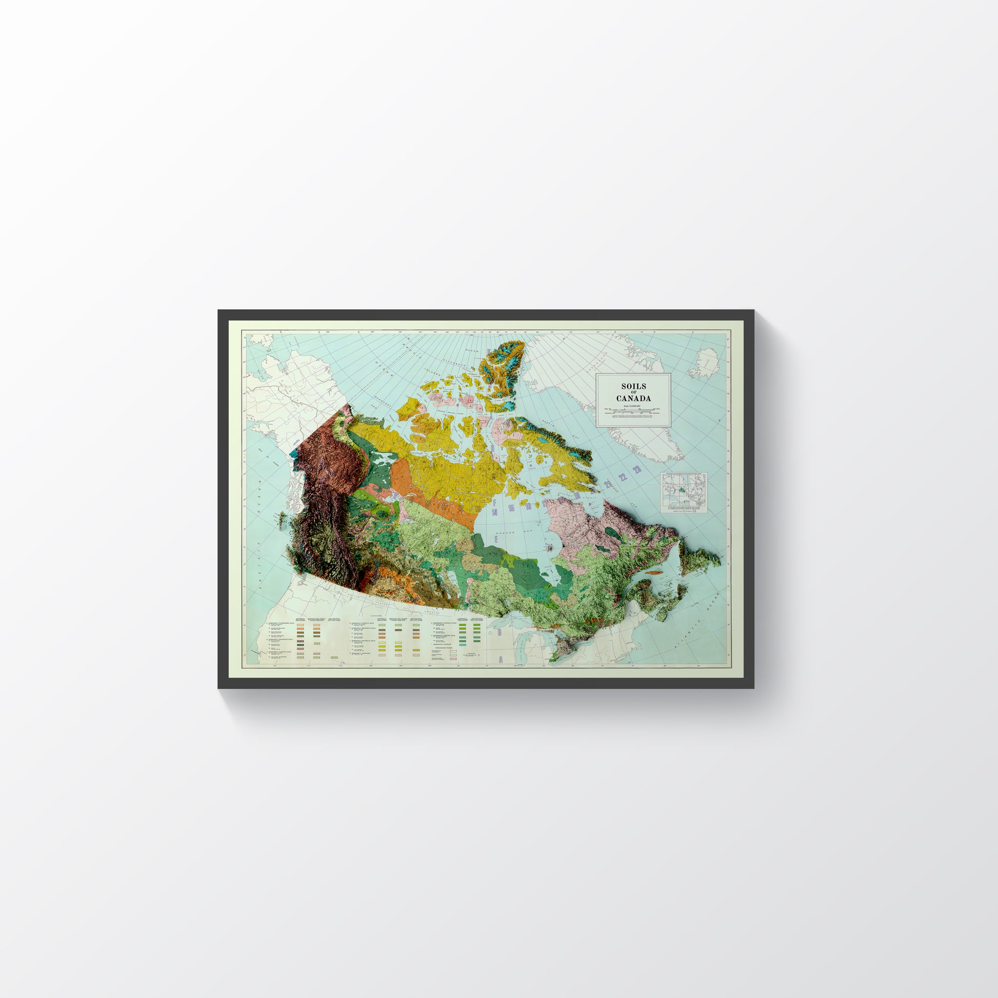 Canada vintage framed shaded relief map in black frame. Artistic print highlighting mountains with a realistic terrain effect