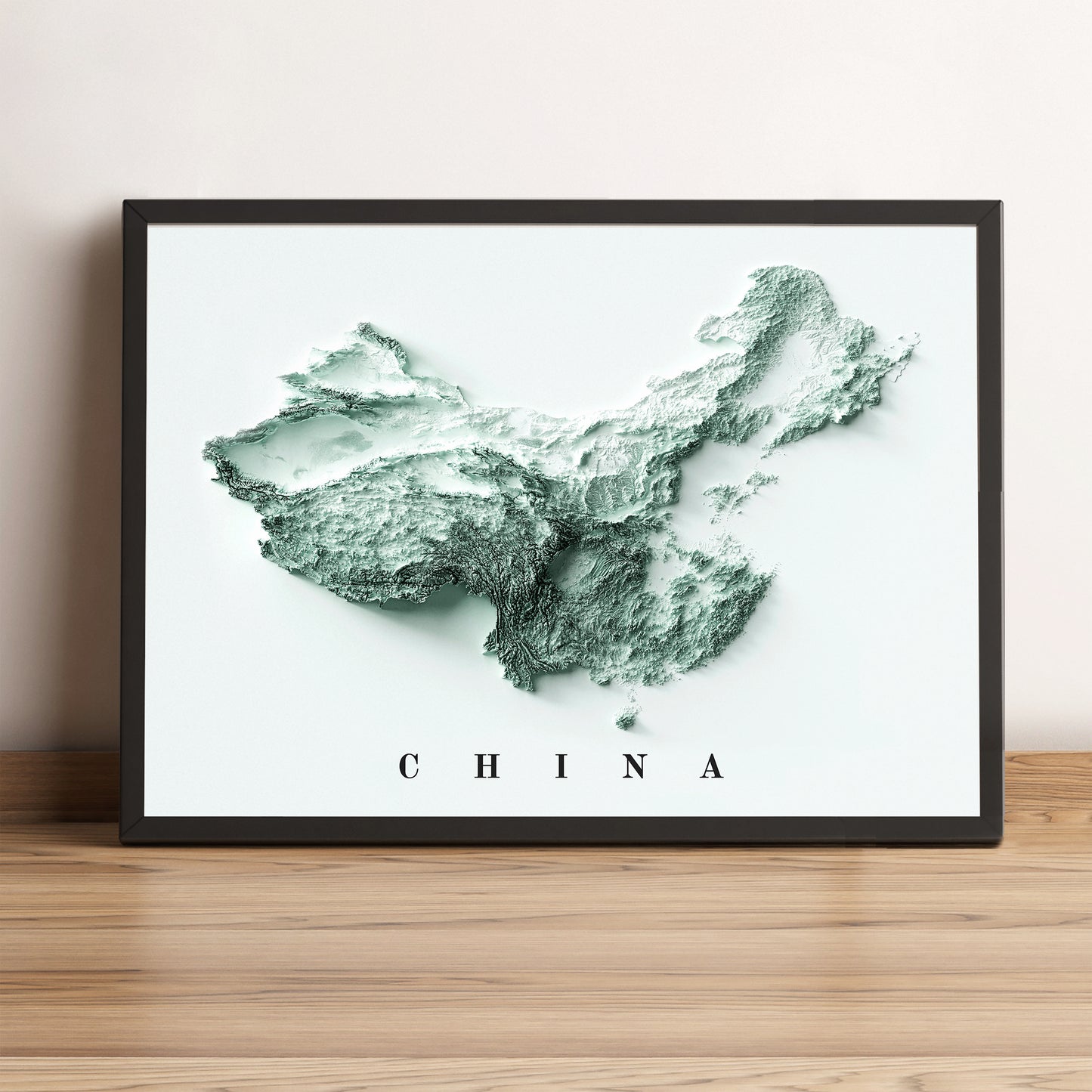 China framed shaded relief map in black frame. Artistic print highlighting mountains with a realistic terrain effect