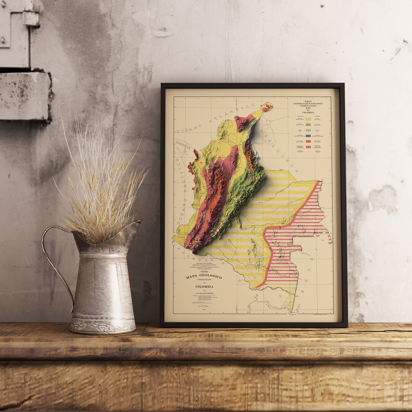 Vintage Colombia shaded relief map in black frame. Realistic terrain art print for home decor, displayed on rustic wooden table