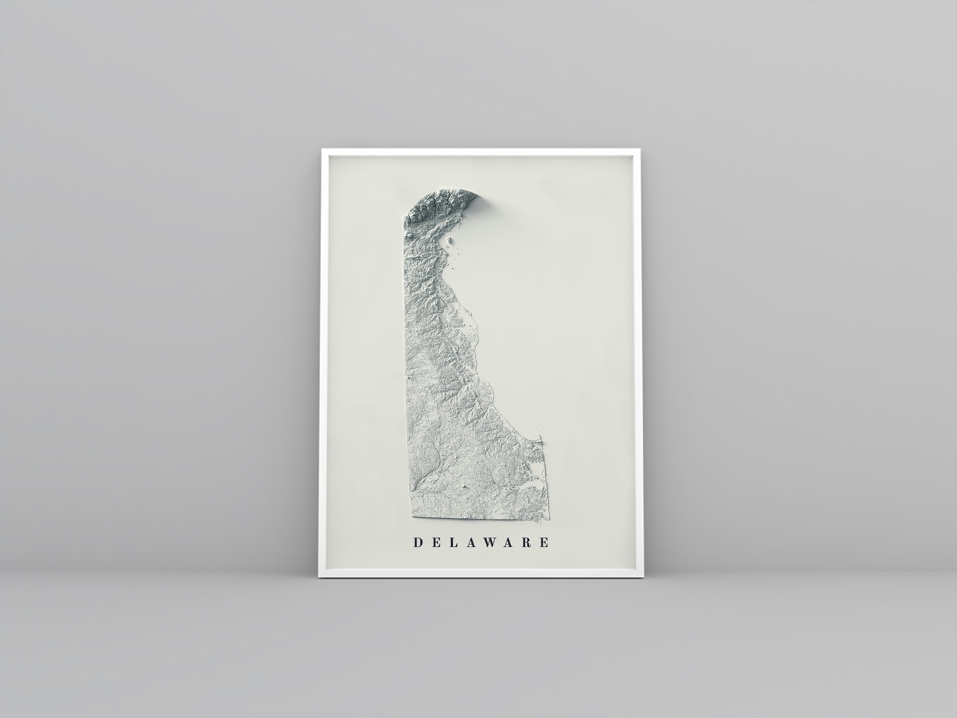 Delaware (USA) vintage framed shaded relief map in white frame. Artistic print highlighting mountains with a realistic 3d effect