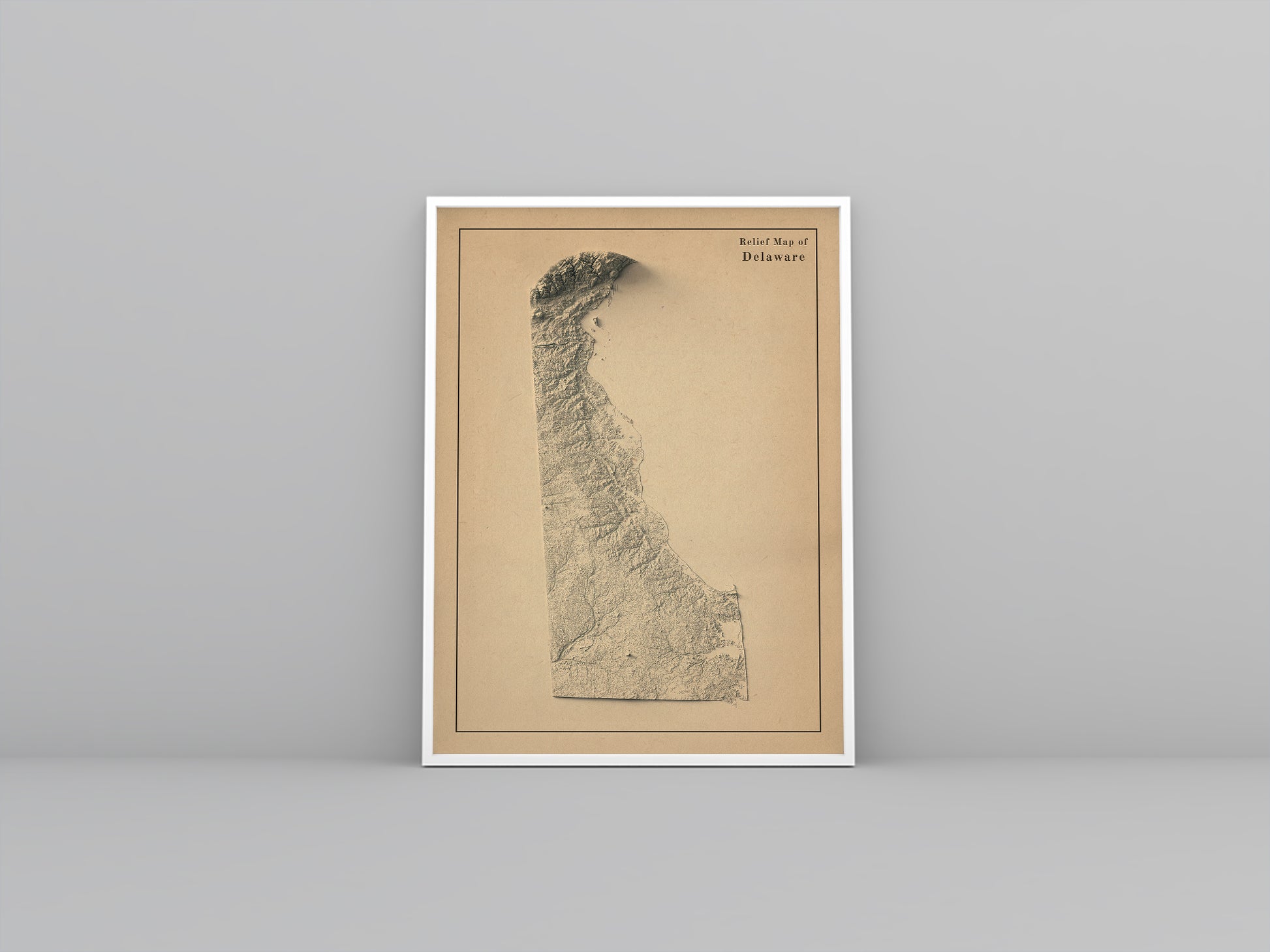 Delaware (USA) vintage framed shaded relief map in white frame. Artistic print highlighting mountains with a realistic 3d effect