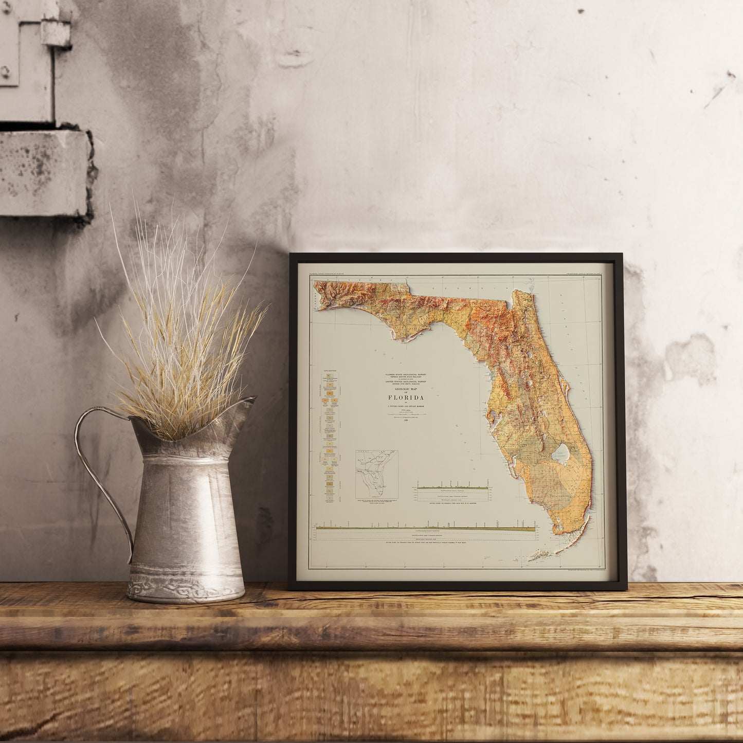 Vintage Florida (USA) shaded relief map in black frame. Realistic terrain art print for home decor, displayed on rustic wooden table