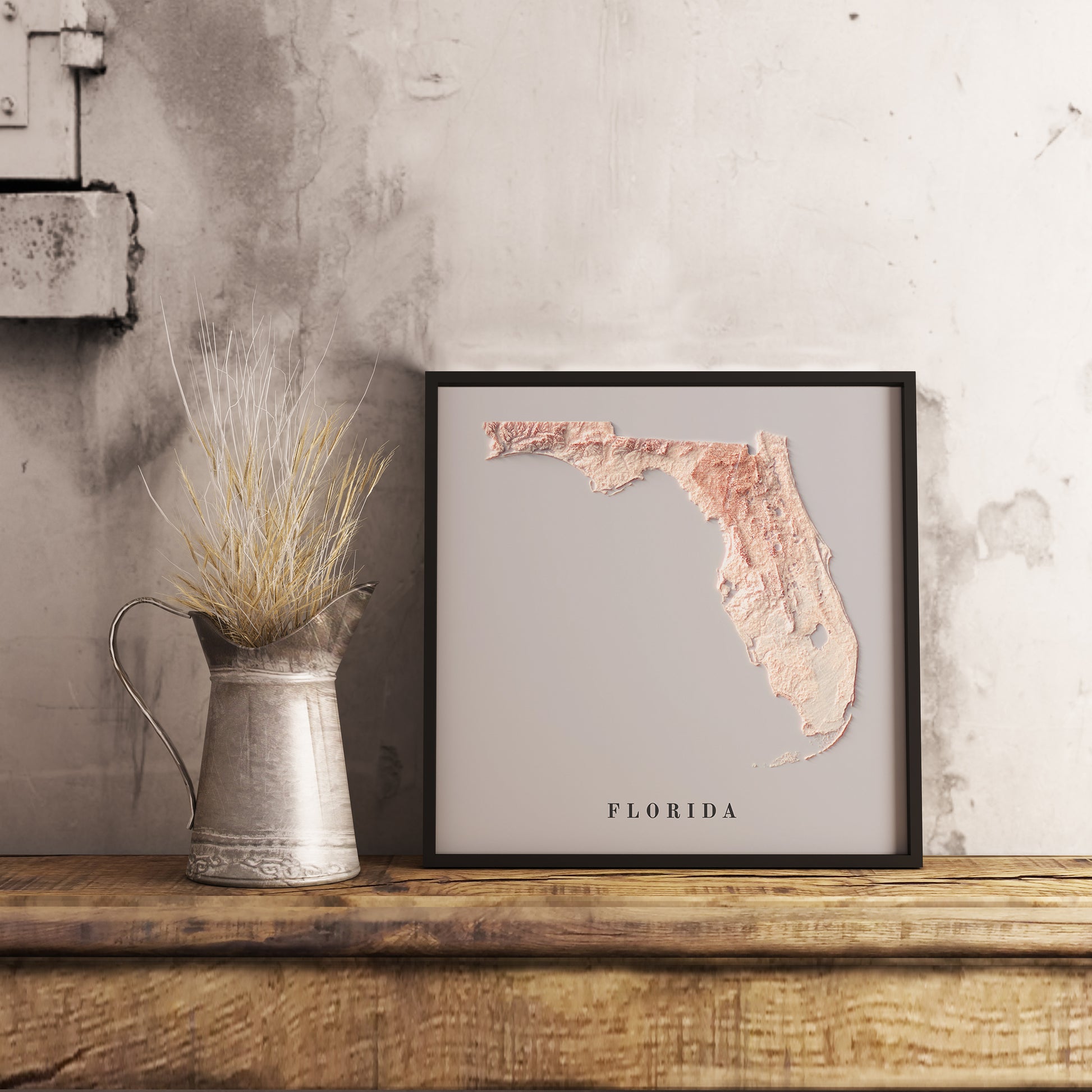 Vintage Florida (USA) shaded relief map in black frame. Realistic terrain art print for home decor, displayed on rustic wooden table