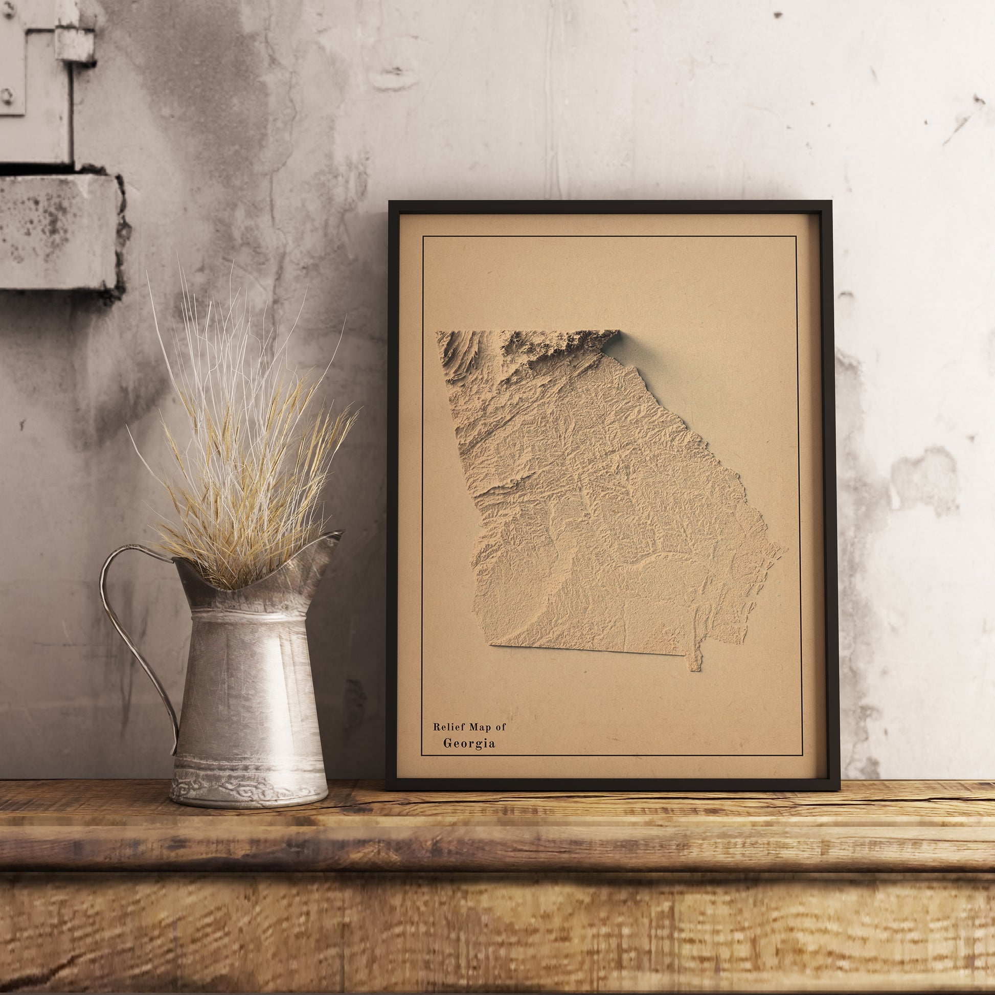 Vintage Georgia (USA) shaded relief map in black frame. Realistic terrain art print for home decor, displayed on rustic wooden table