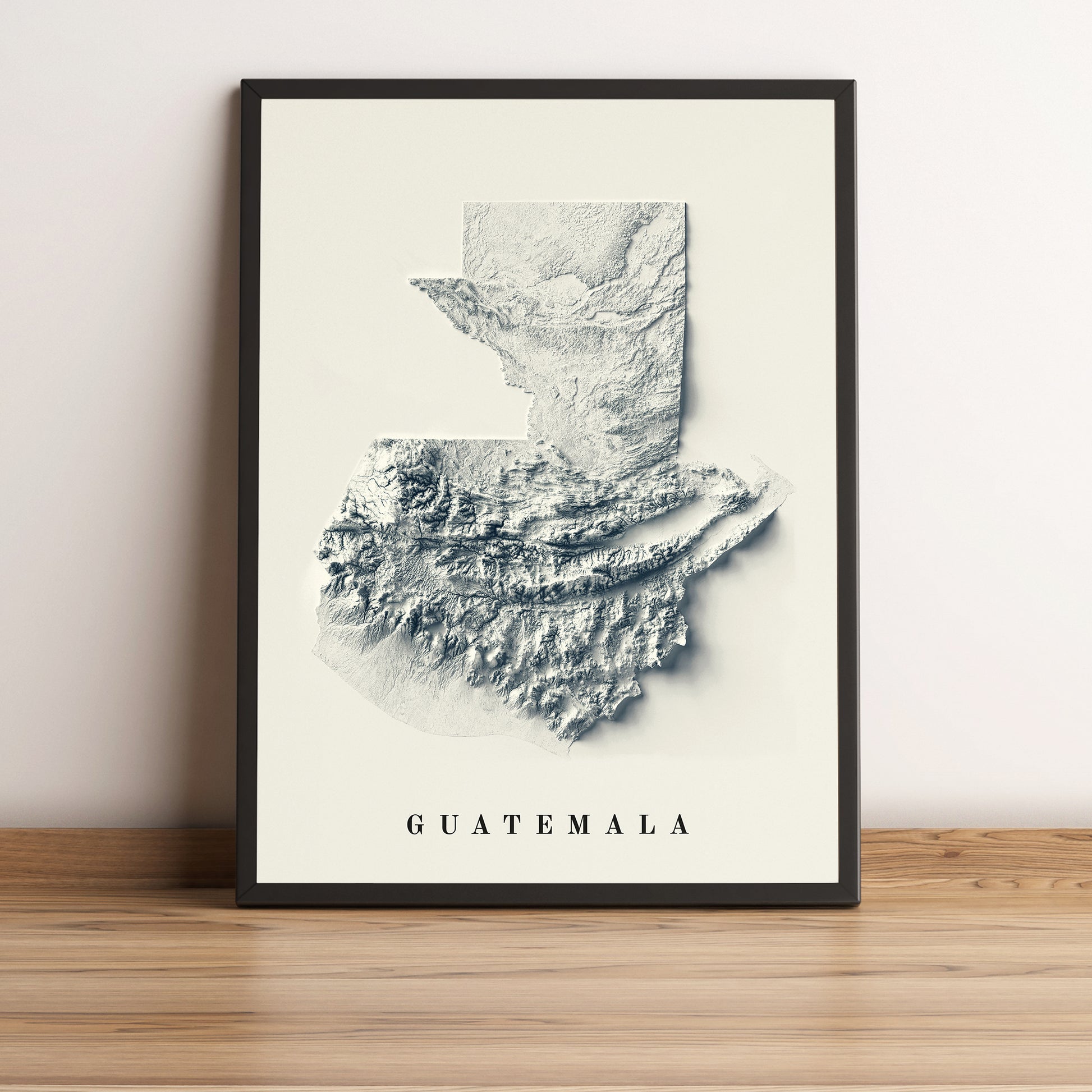 Guatemala framed shaded relief map in black frame. Artistic print highlighting mountains with a realistic terrain effect