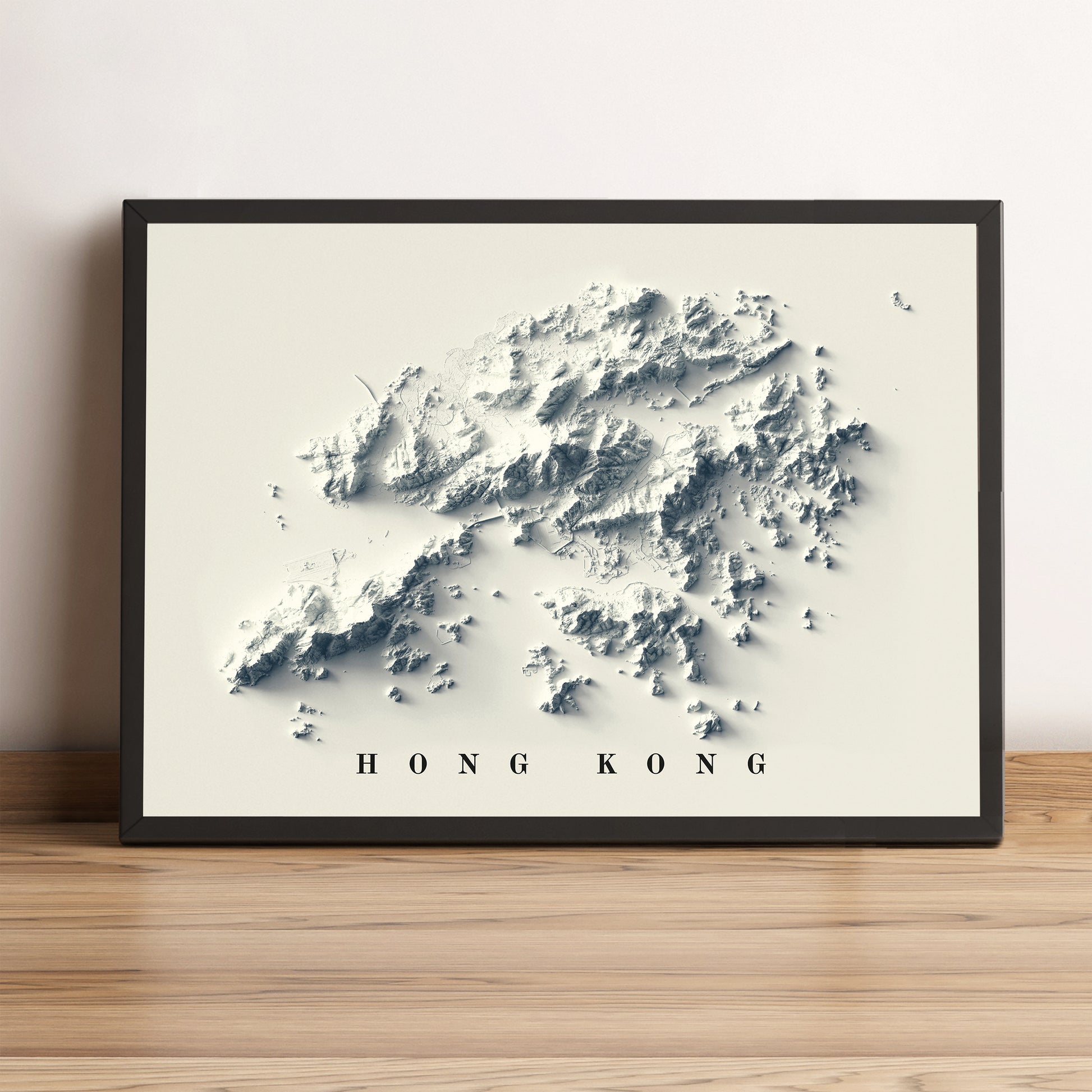 Hong Kong framed shaded relief map in black frame. Artistic print highlighting mountains with a realistic terrain effect