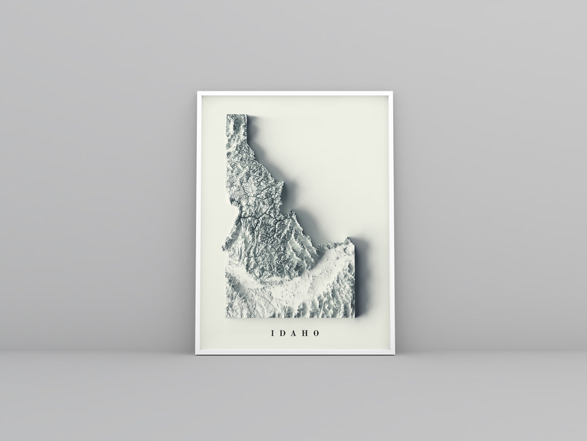 Idaho (USA) framed shaded relief map in white frame. Artistic print highlighting mountains with a realistic 3d effect