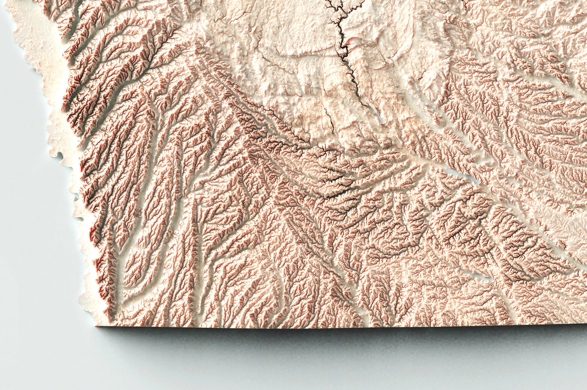 Detailed close-up of a Iowa (USA) relief map, showcasing textured topography and geographic contours
