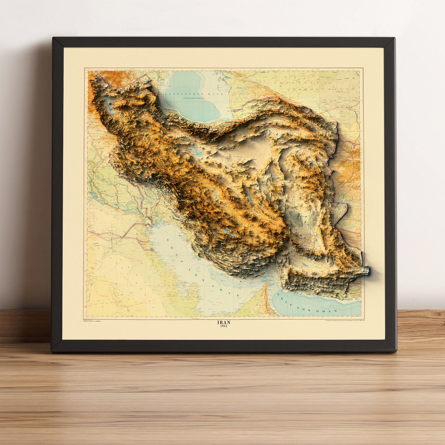 Iran vintage framed shaded relief map in black frame. Artistic print highlighting mountains with a realistic terrain effect
