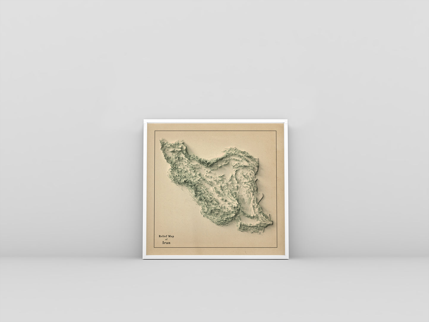 Iran vintage framed shaded relief map in white frame. Artistic print highlighting mountains with a realistic 3d effect