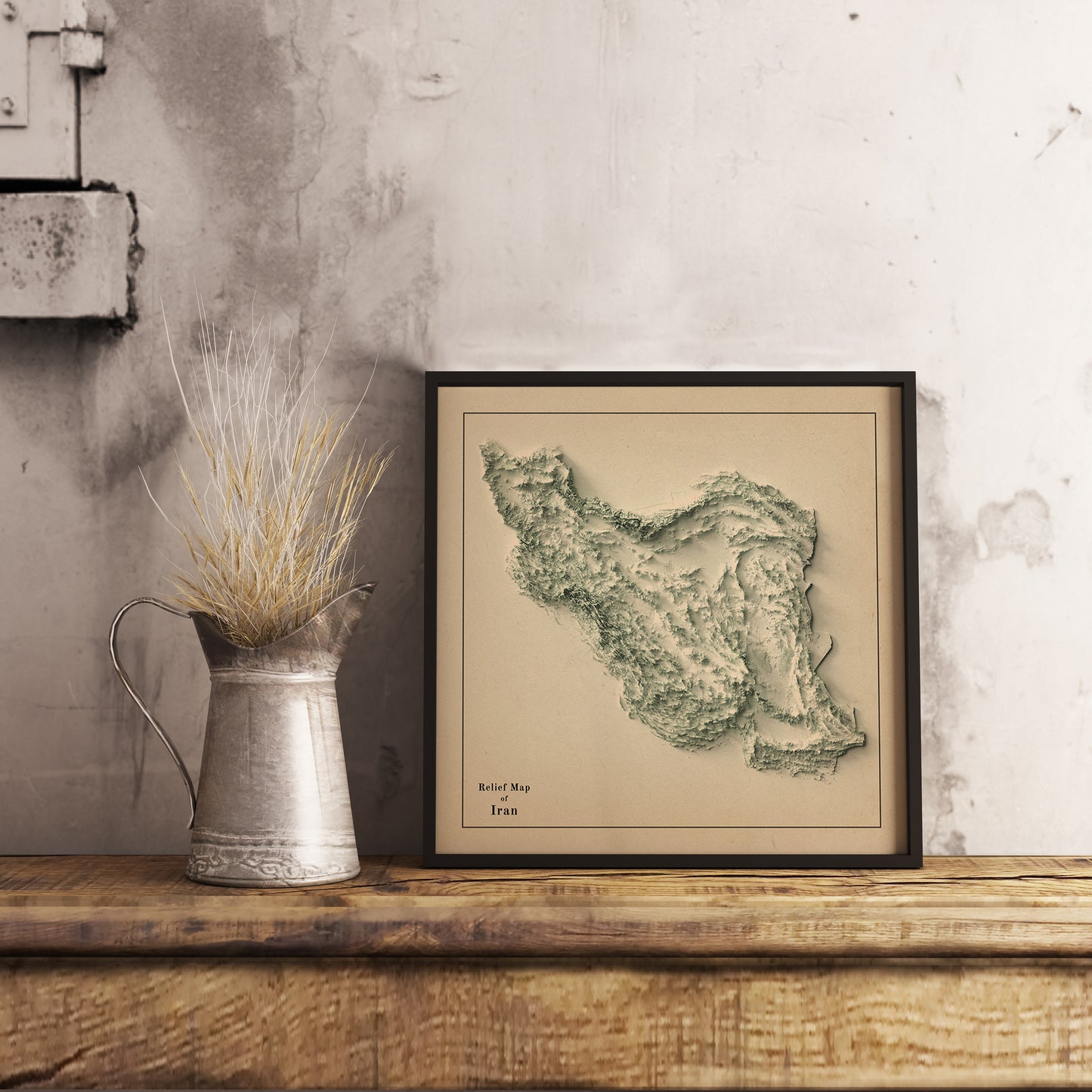 Vintage Iran shaded relief map in black frame. Realistic terrain art print for home decor, displayed on rustic wooden table