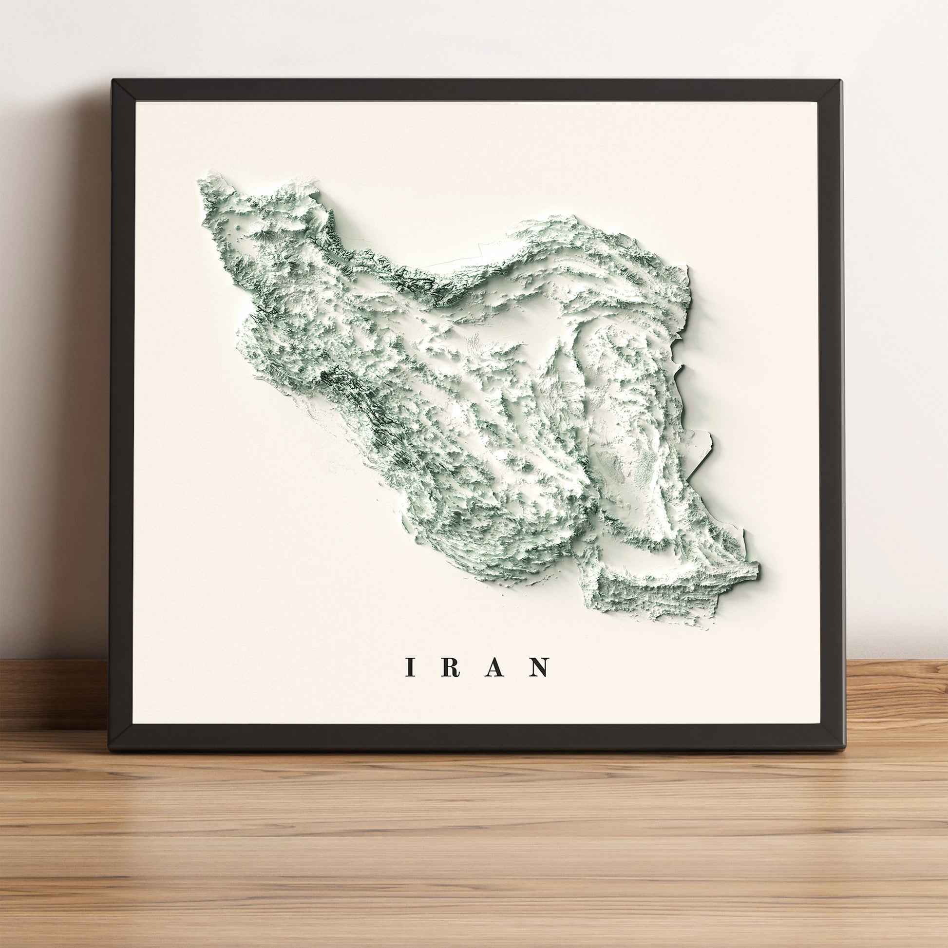 Iran vintage framed shaded relief map in black frame. Artistic print highlighting mountains with a realistic terrain effect