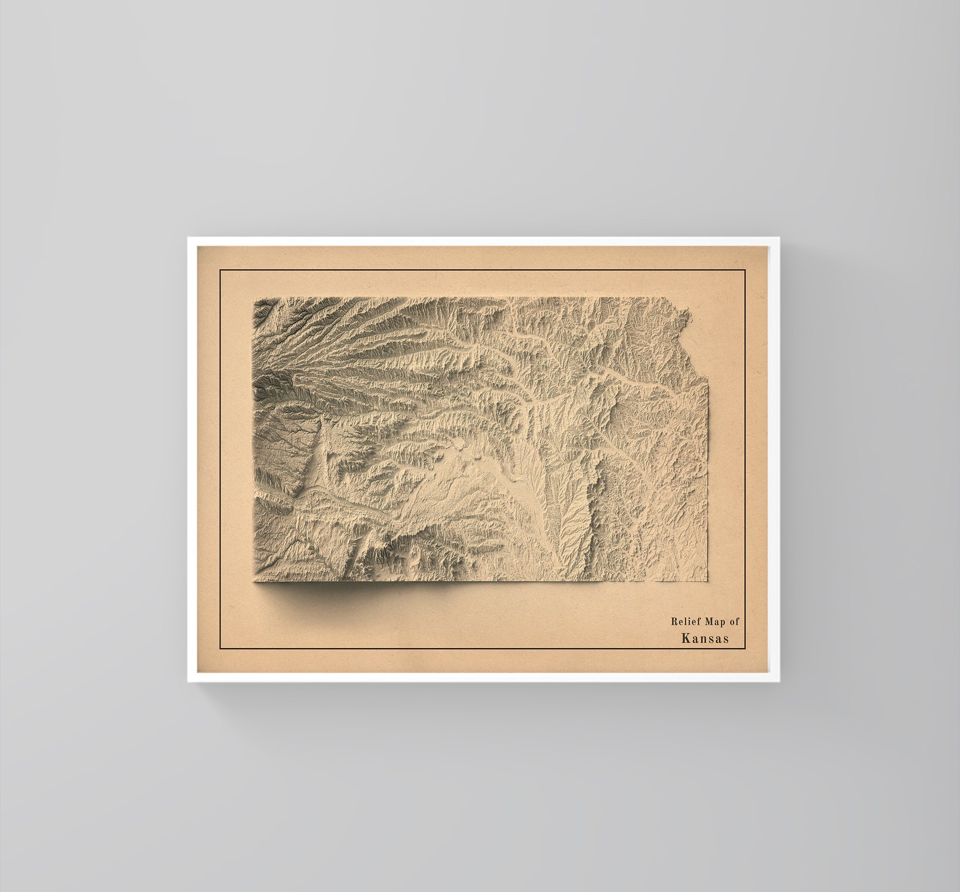 Kansas (USA) vintage framed shaded relief map in white frame. Artistic print highlighting mountains with a realistic 3d effect