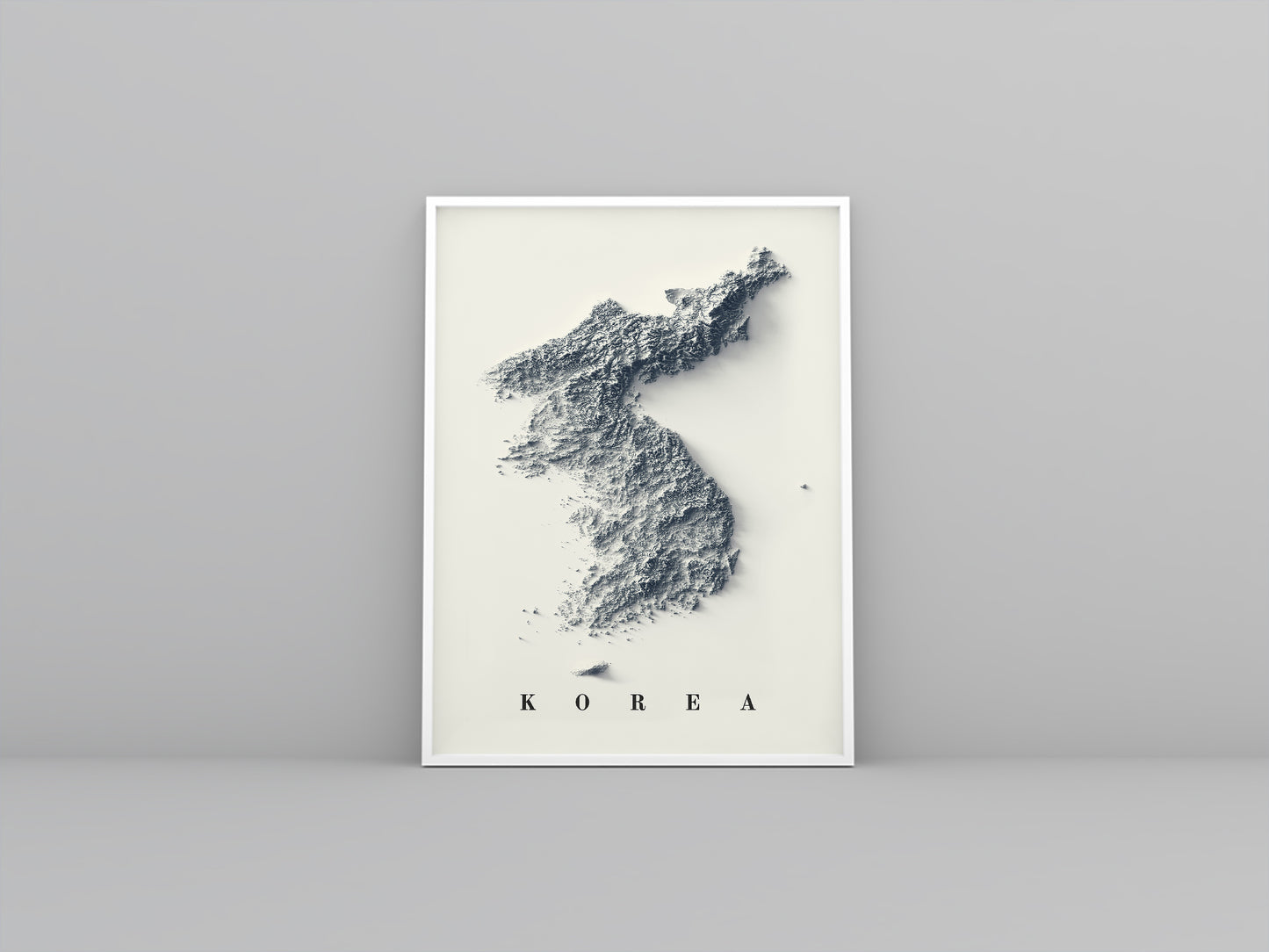 North and South Koreas framed shaded relief map in white frame. Artistic print highlighting mountains with a realistic 3d effect