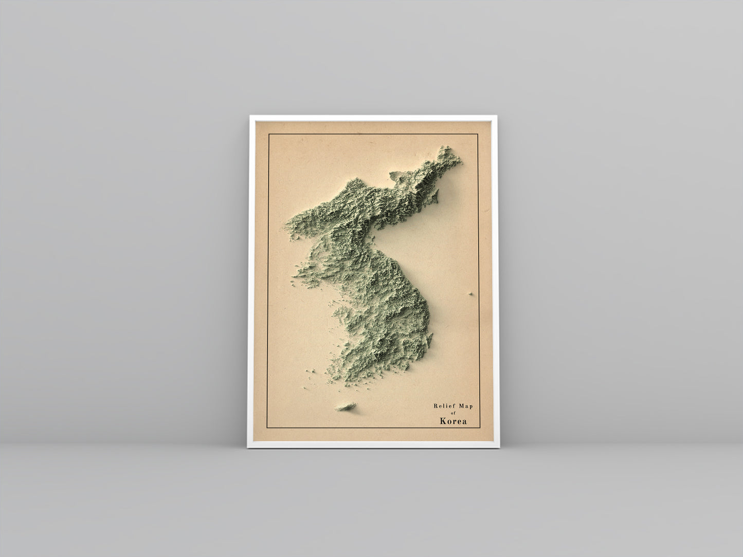 North and South Koreas vintage framed shaded relief map in white frame. Artistic print highlighting mountains with a realistic 3d effect