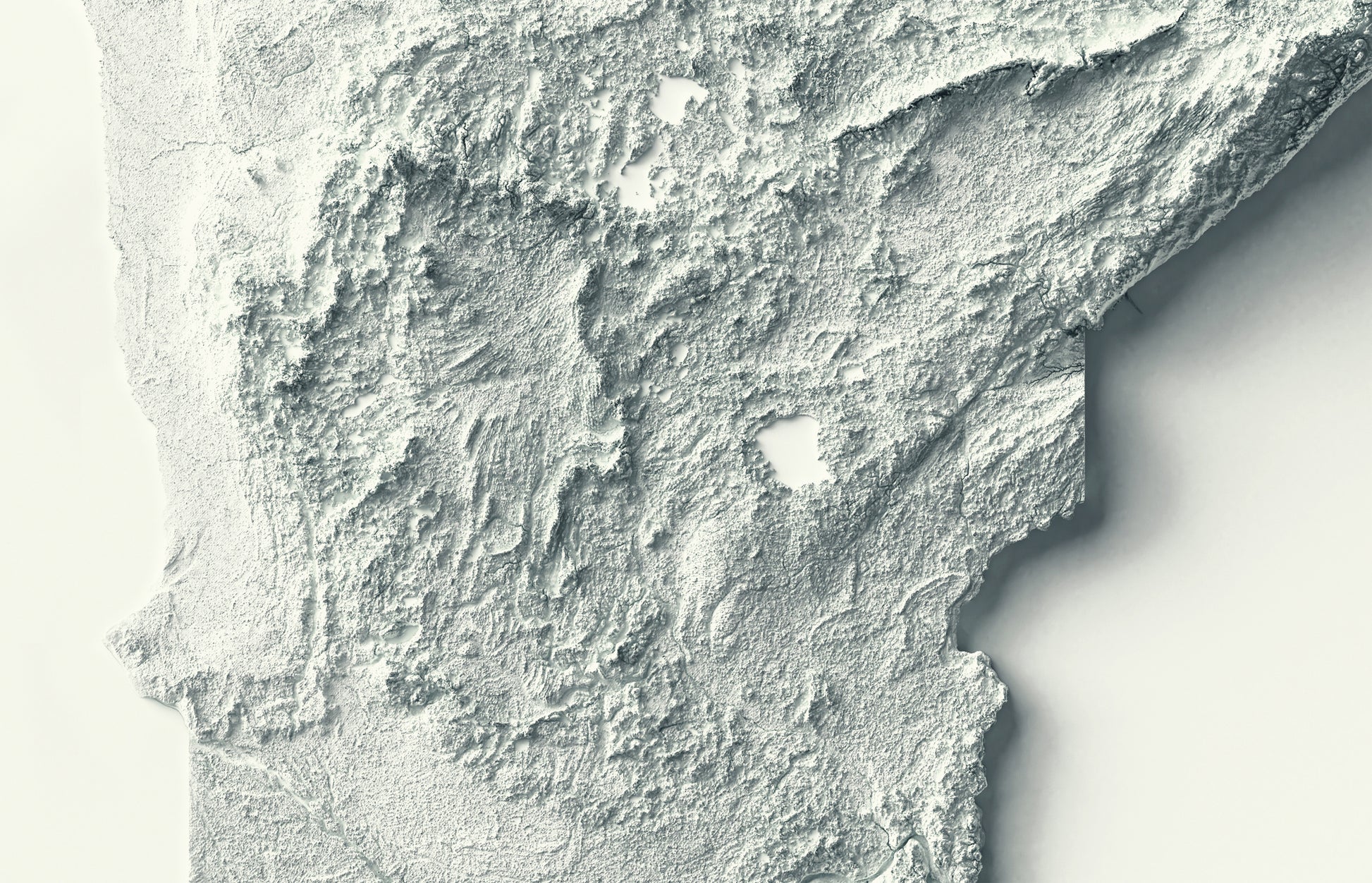 Detailed close-up of a Minnesota (USA) relief map, showcasing textured topography and geographic contours