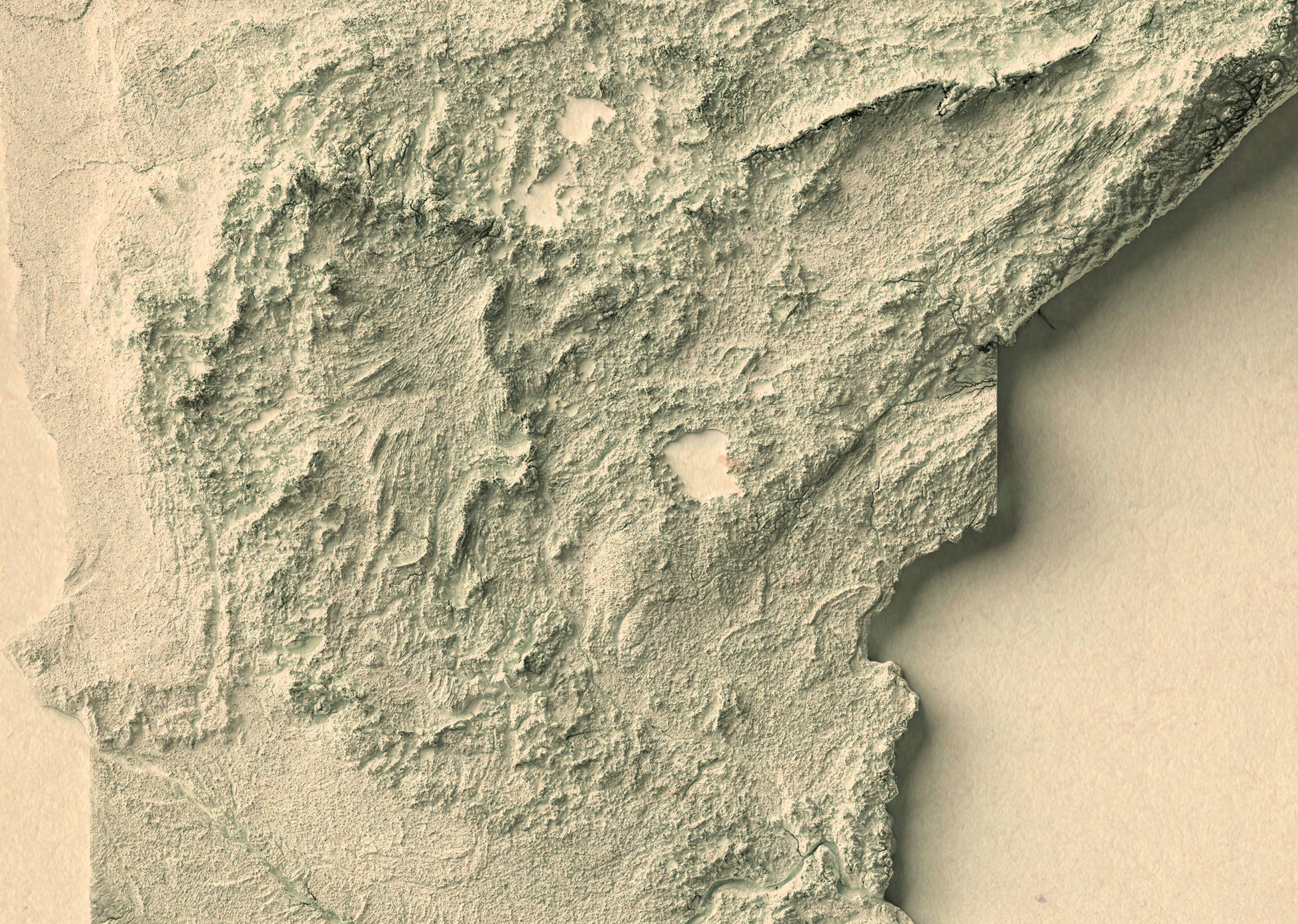 Detailed close-up of a vintage Minnesota (USA) relief map, showcasing textured topography and geographic contours